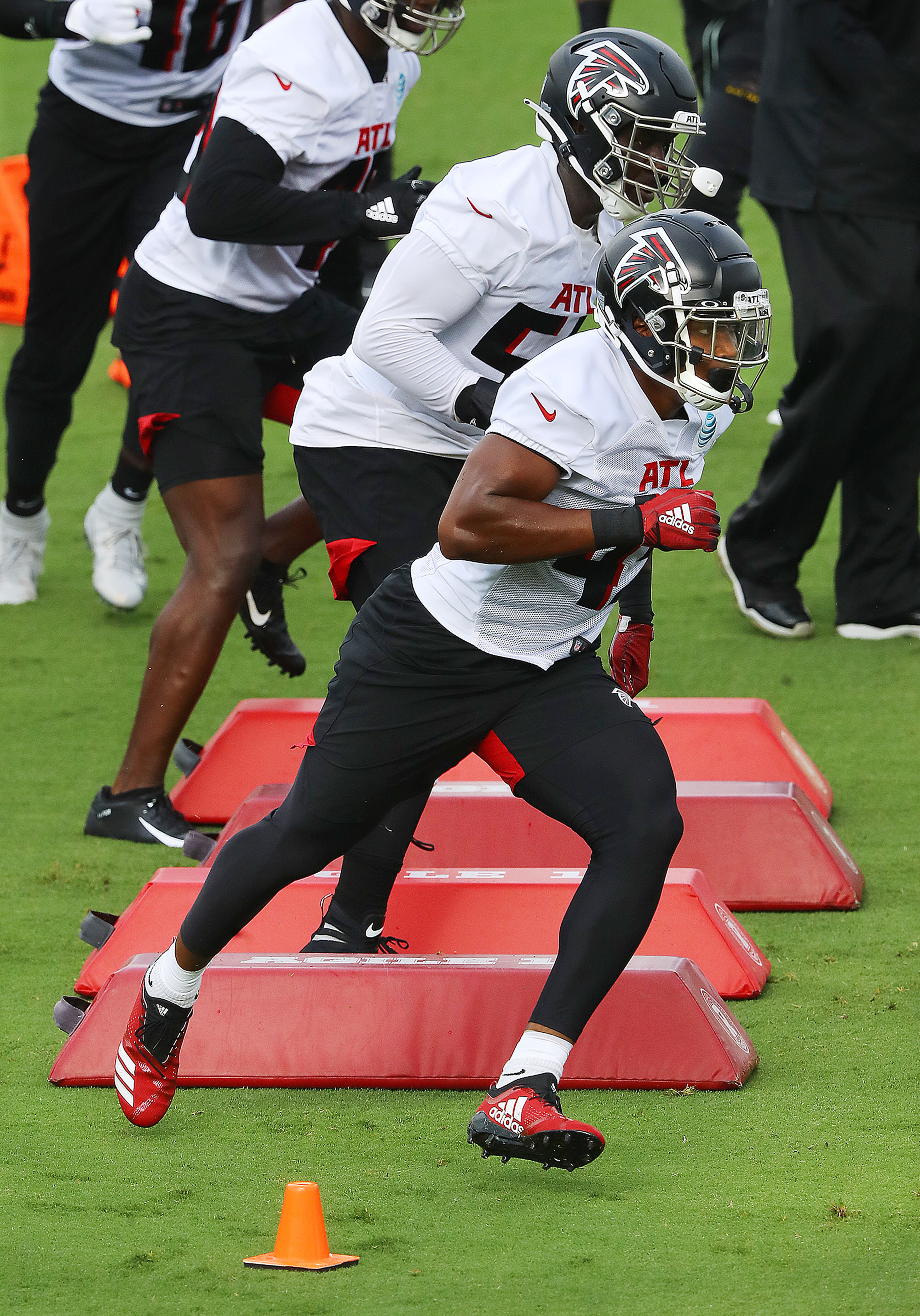 Falcons rookie linebacker Mykal Walker runs an agility drill during training camp on Saturday, August 15, 2020 in Flowery Branch. Curtis Compton ccompton@ajc.com
