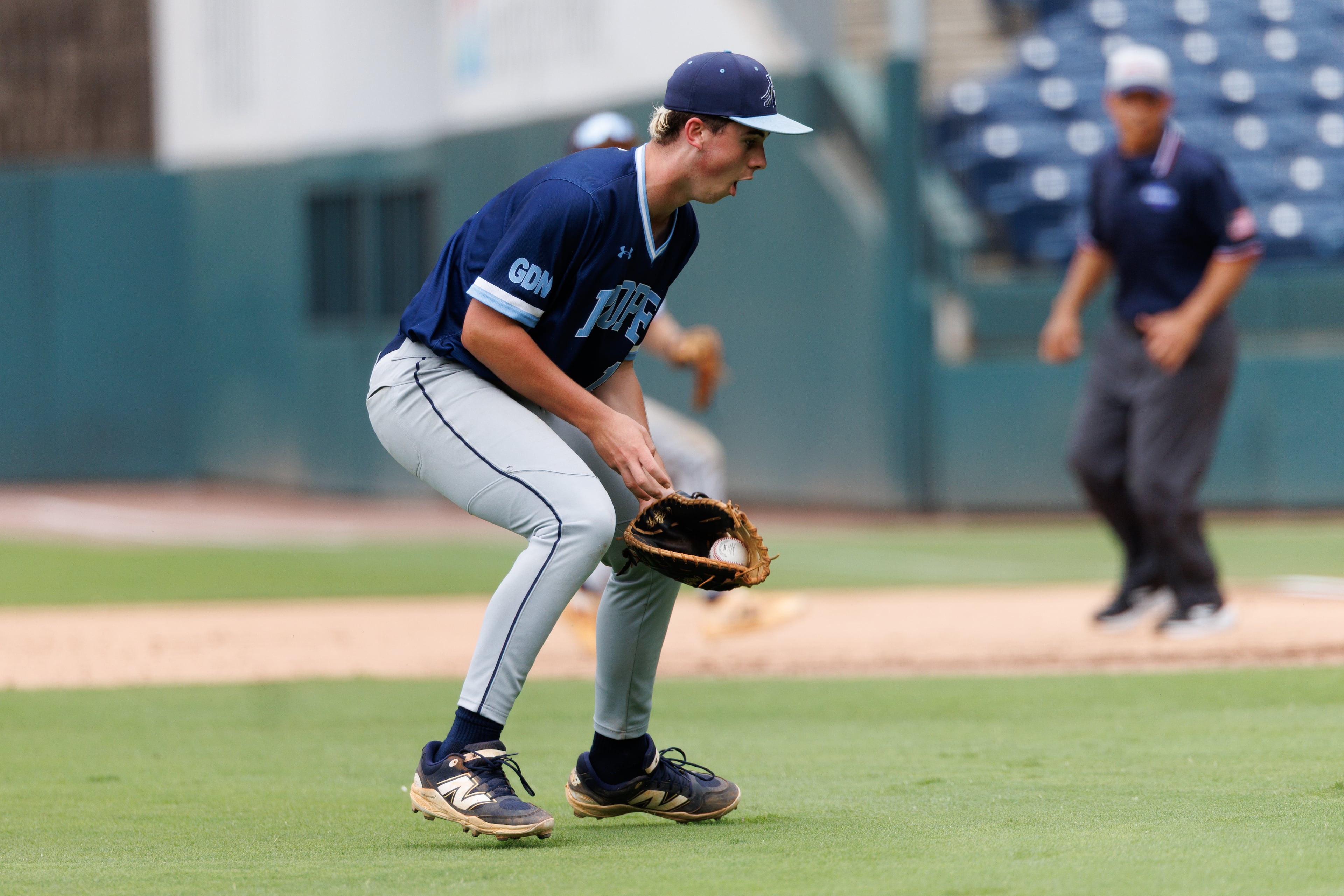 Pope shortstop Luke Winbush picks up the ball during the fifth inning of Game 1 of the GHSA Class 5A baseball state championship series Monday, May 25, 2026, at Gwinnett Field in Lawrenceville. (Estela Muñoz/AJC)