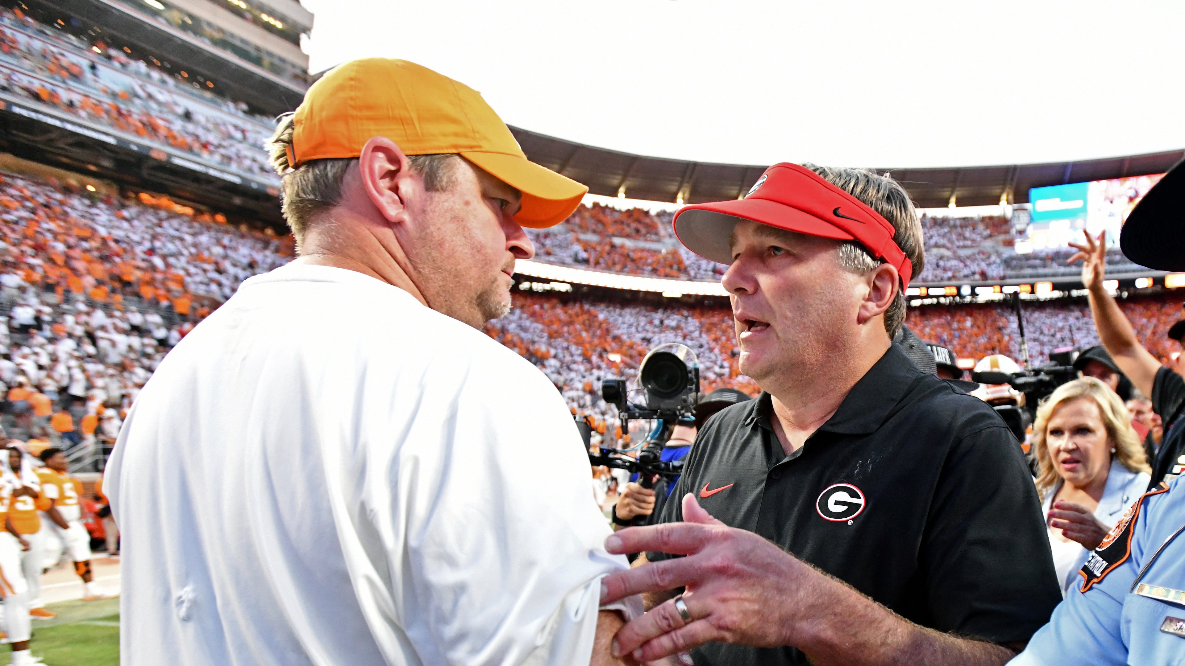 Georgia head coach Kirby Smart and Tennessee head coach Josh Heupel shake hands after Georgia beat Tennessee during overtime in an NCAA football game at Neyland Stadium, Saturday, September 13, 2025, in Knoxville, Tenn. Georgia won 44-41 over Tennessee in overtime.