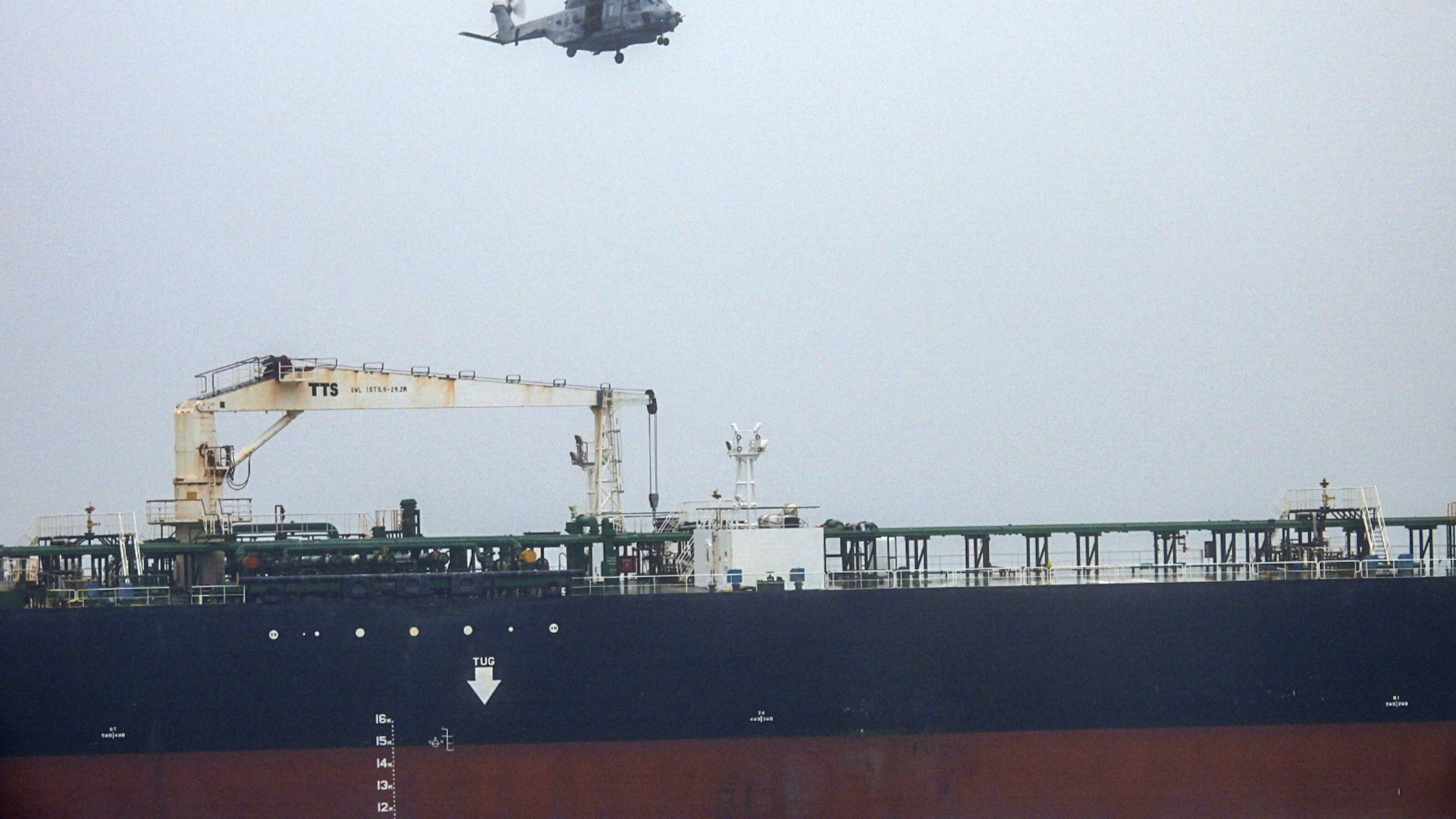 In this handout photo provided by the French Army, an NH90 helicopter intercepts an oil tanker that was traveling from Russia under international sanctions, on the Atlantic Sea, Sunday, May 31, 2026. (French Army via AP)