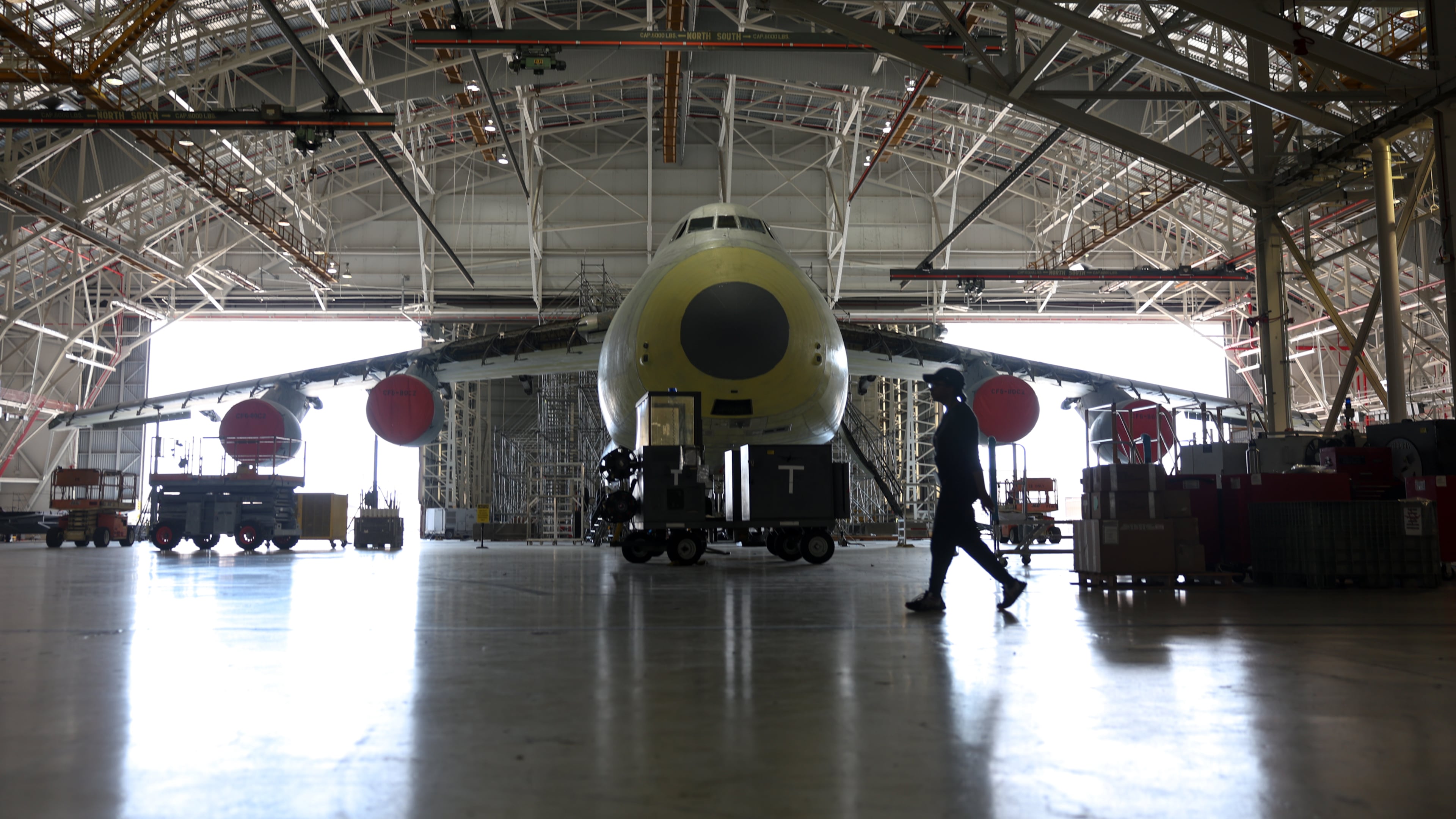 A C-5 aircraft is under repair at a hangar in Robins Air Force Base in Houston County on Aug. 21, 2026. (Arvin Temkar/AJC)