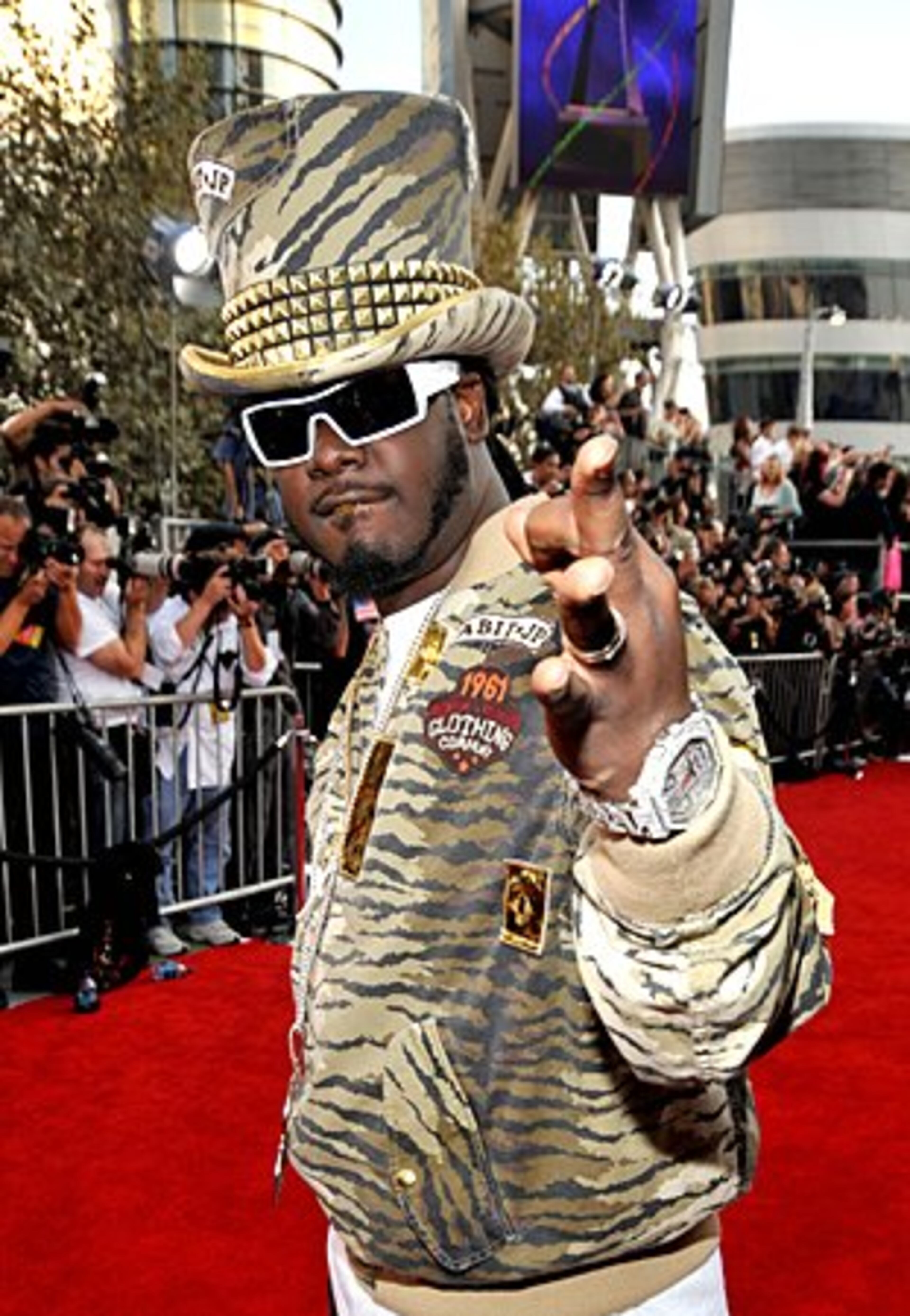 Rapper T-Pain arrives.