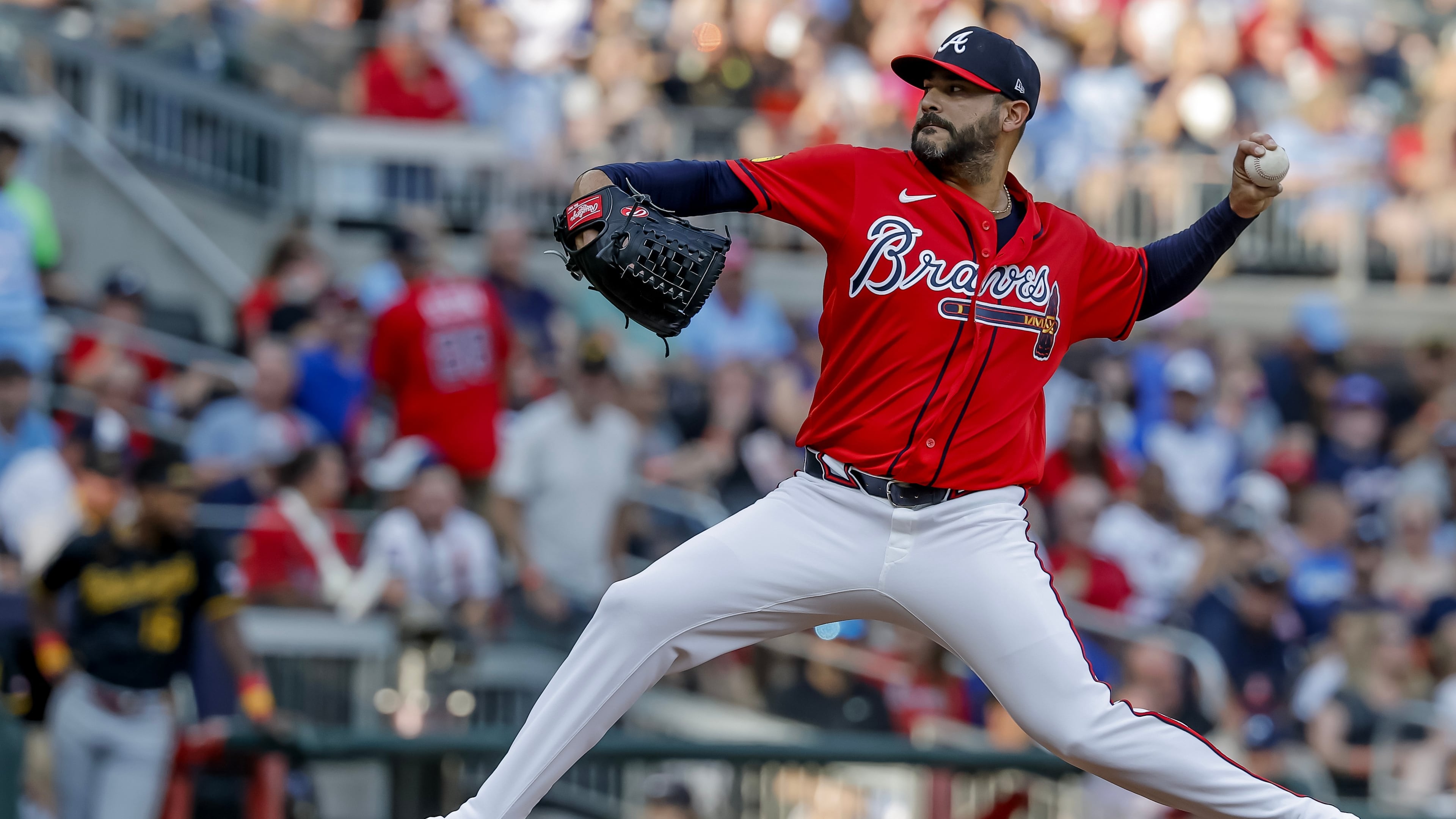 Pitcher Martín Pérez, shown here delivering to a Pirates batter earlier this month, has excelled in several different roles for the Braves. (Erik S. Lesser/AP)
