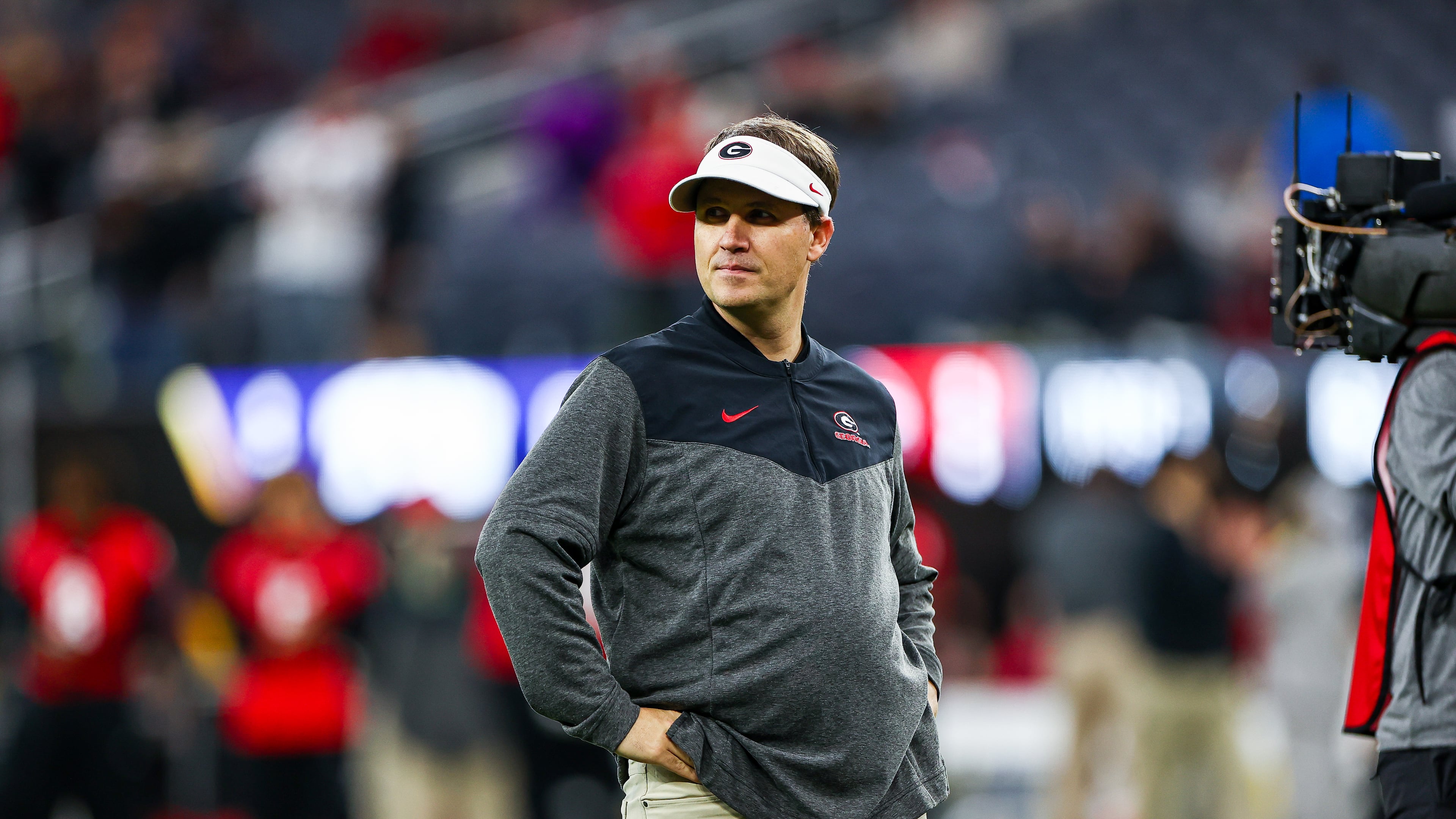 Buster Faulkner, shown here while in his role as Georgia’s offensive quality control coach during the 2023 College Football Playoff national championship game, was hired by Georgia Tech as its offensive coordinator in December 2022. (Tony Walsh/Georgia Athletics)