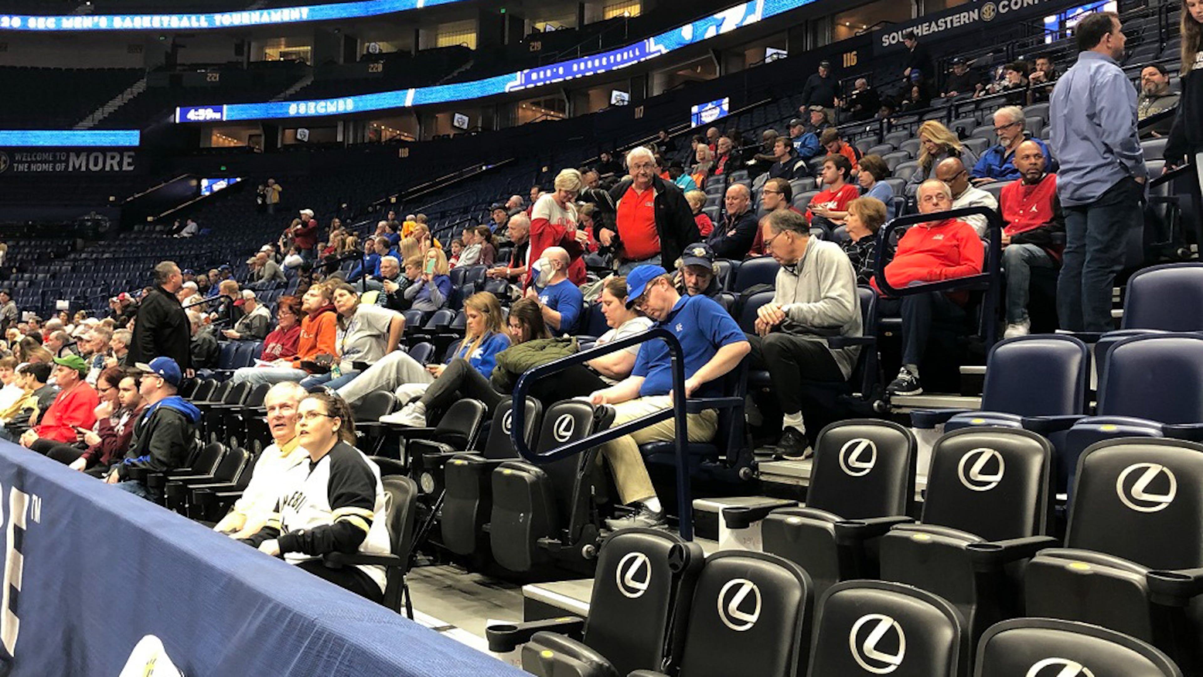 The scene at Bridgestone Arena in Nashville, with few spectators on hand one hour before Georgia and Ole Miss were to tip off to begin the 2020 SEC men's basketball tournament. (Photo by Chip Towers/AJC)