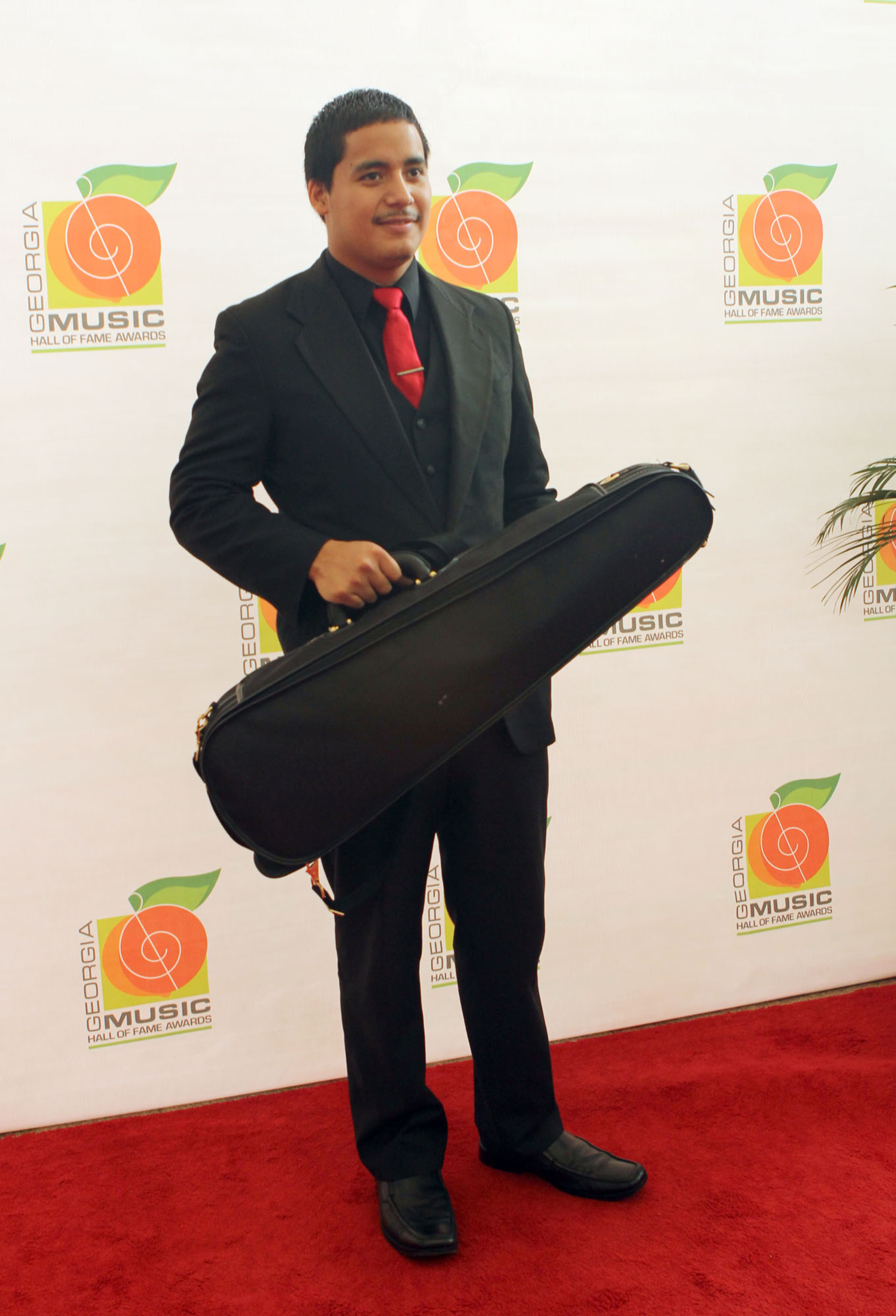 2012 Scholarship Honoree, violinist Jonathan Urizar, appears on the red carpet at the Georgia Music Hall of Fame event at the Cobb Energy Performing Arts Centre on Sunday, Oct. 14, 2012.