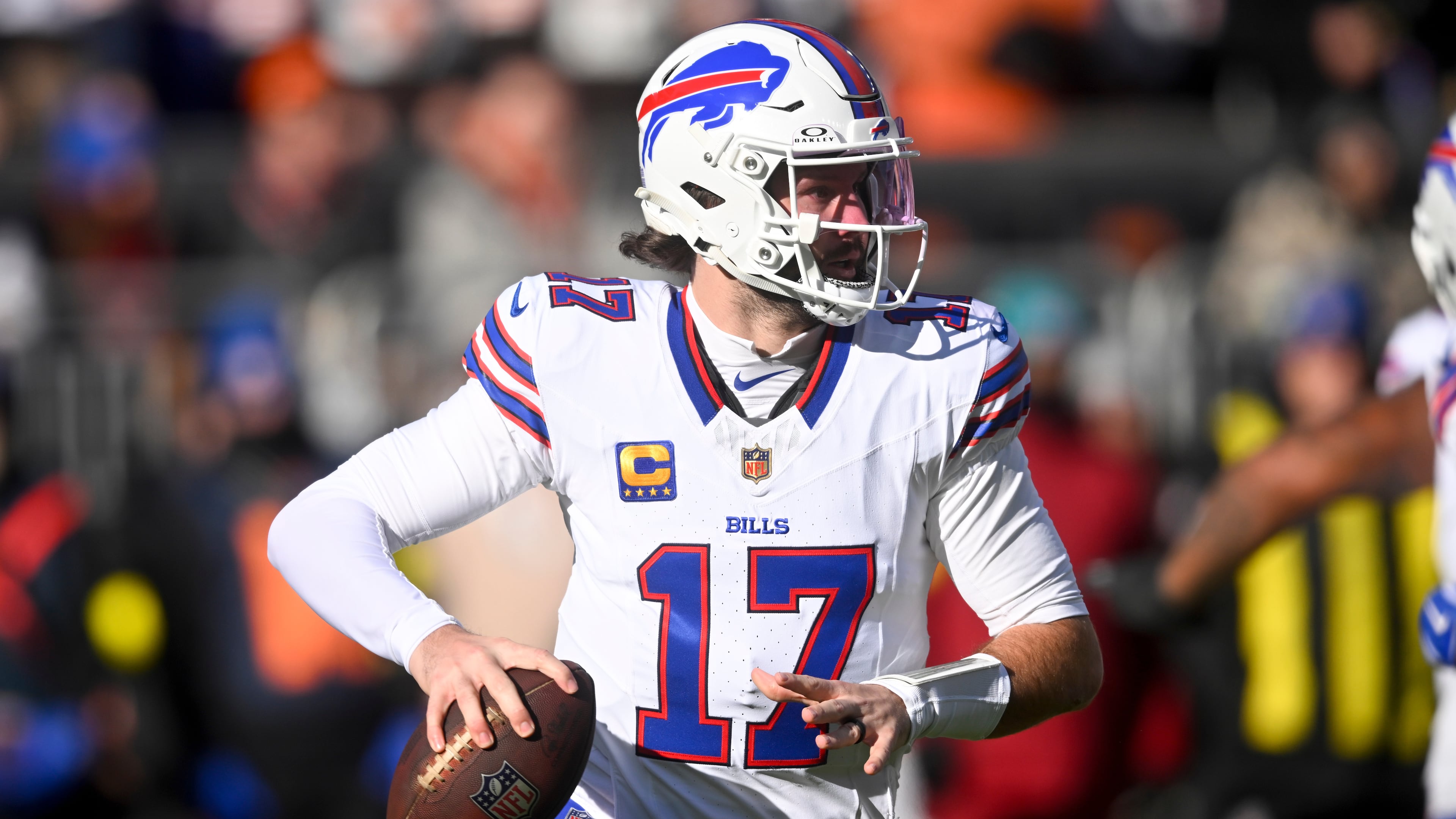 Buffalo Bills quarterback Josh Allen looks to throw against the Cleveland Browns during the first half of an NFL football game in Cleveland, Sunday, Dec. 21, 2025. (AP Photo/David Richard)