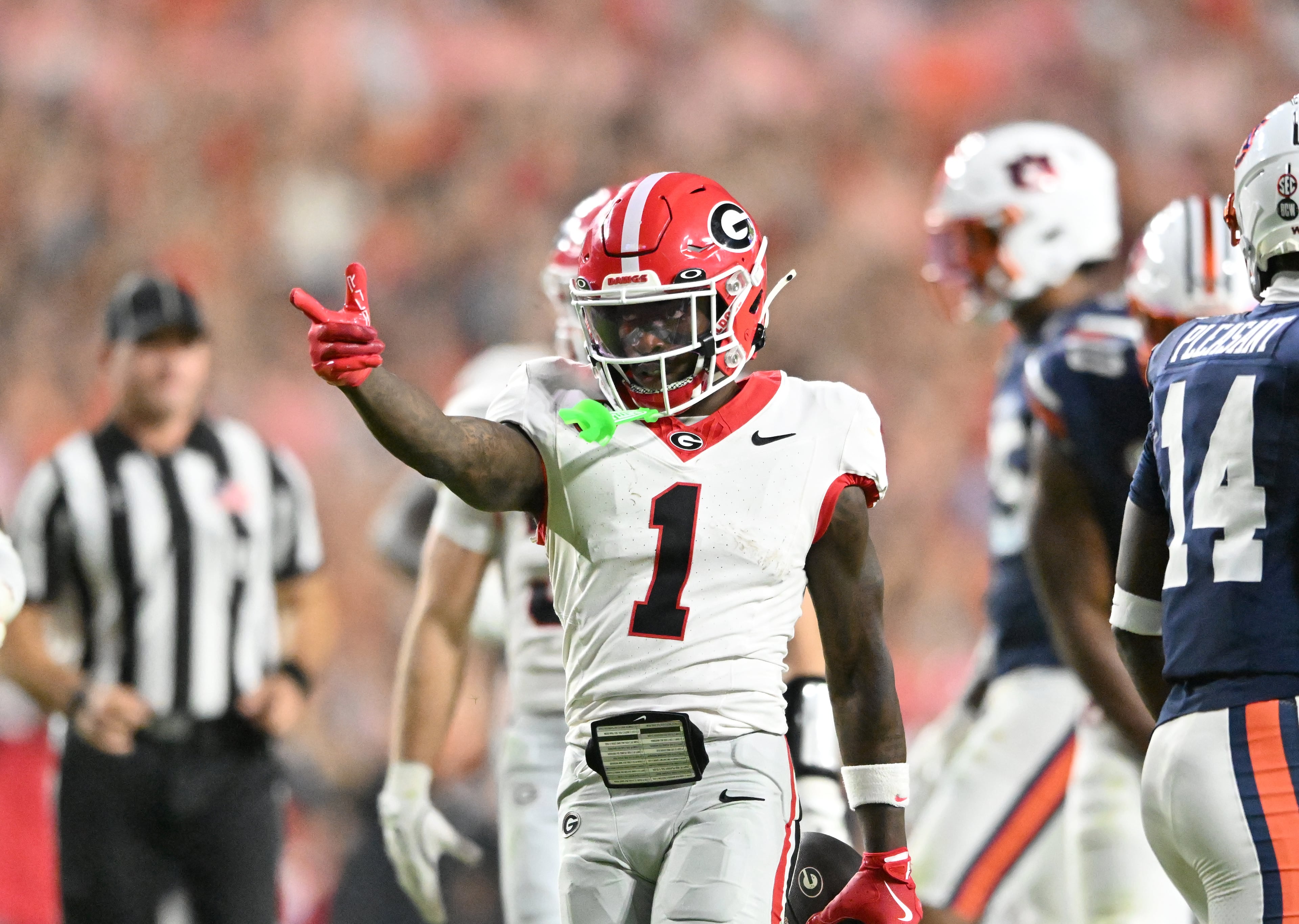 Georgia wide receiver Zachariah Branch (1) reacts after he ran for a first down during the second half in a NCAA college football game at Jordan-Hare Stadium, Saturday, October 11, 2025, in Auburn, Ala. Georgia won 20-10 overAuburn. (Hyosub Shin / AJC)