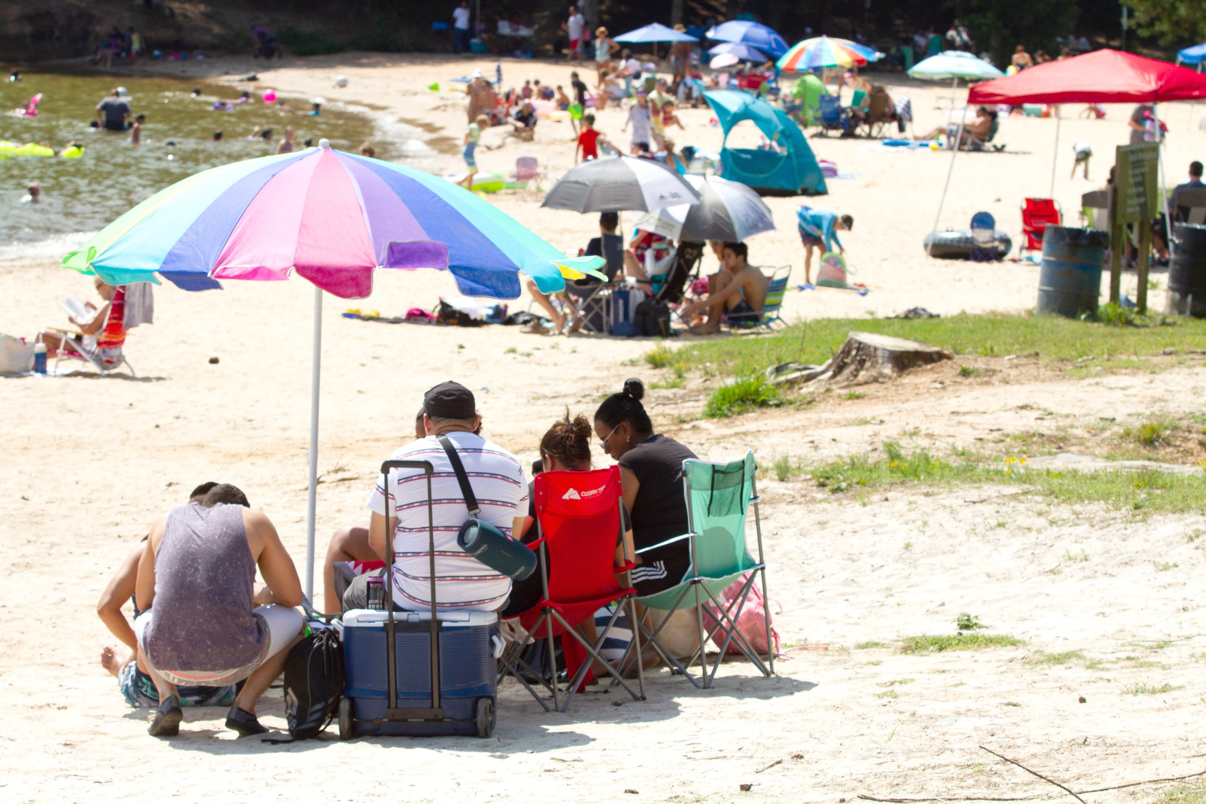 People enjoy the beach at Mary Alice Park on Lake Lanier, September 6, 2020. STEVE SCHAEFER / SPECIAL TO THE AJC