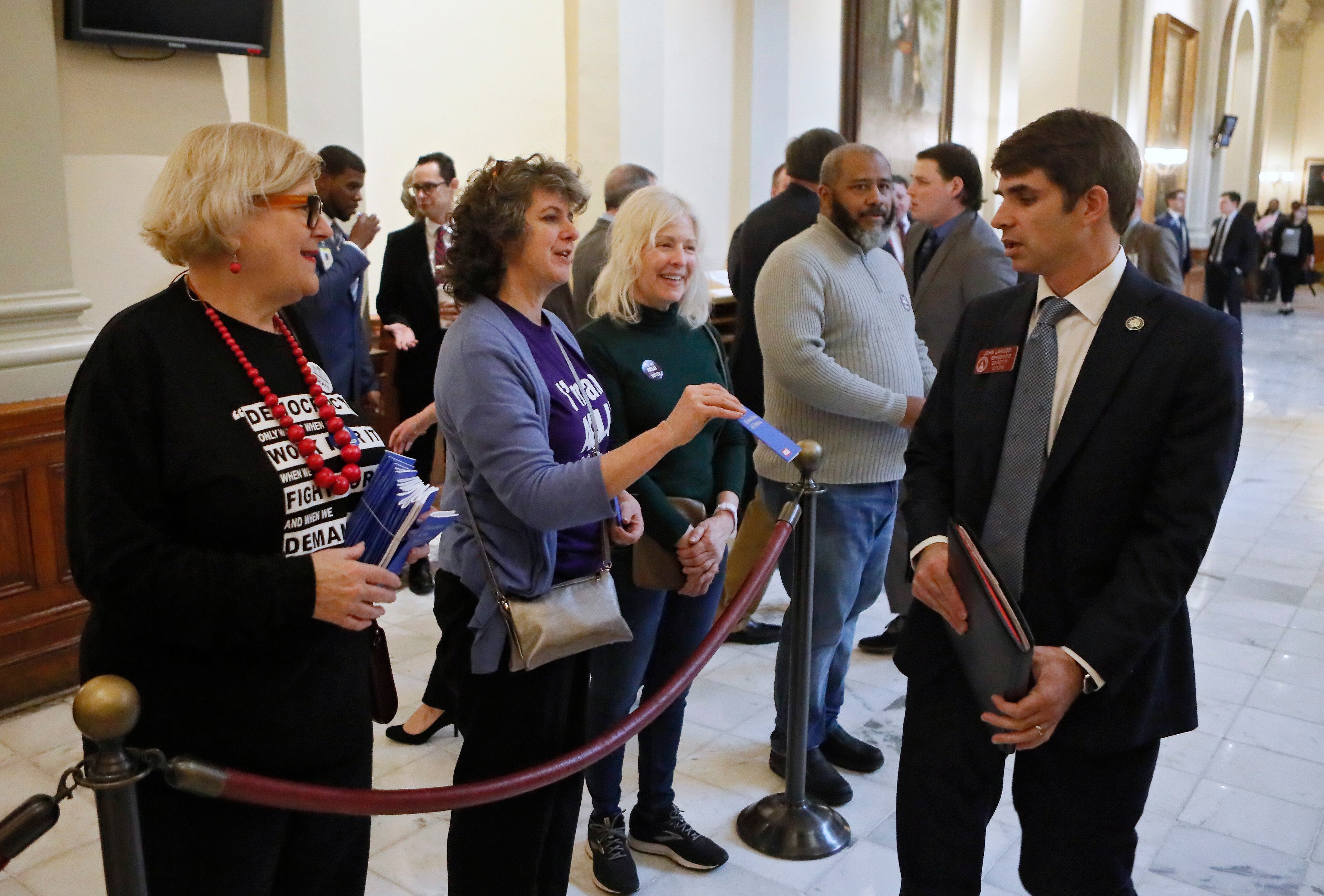 January 13, 2020 - Atlanta - Rep. John LaHood (right),
R - Valdosta, is offered a copy of the US Constitution by ACLA volunteers that were greeting lawmakers as they entered the House. The Georgia General Assembly started its 2020 session amid a backdrop of an election year. ACLU volunteers greeted lawmakers and offered copies of the constitution. Bob Andres / bandres@ajc.com