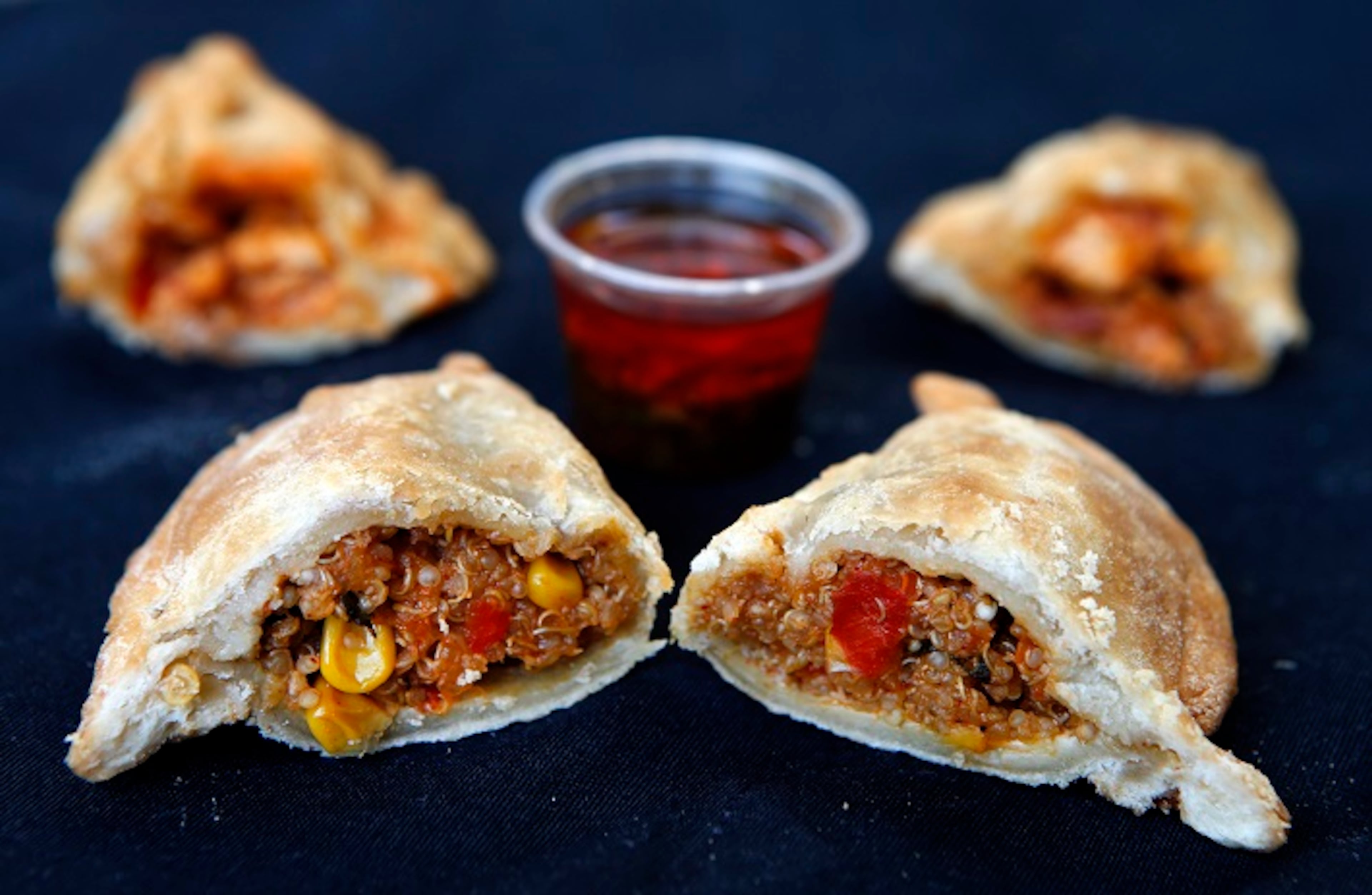 Quinoa empanadas, foreground, and chicken empanadas are on the menu at Mapuche. (Mel Melcon/Los Angeles Times/TNS)