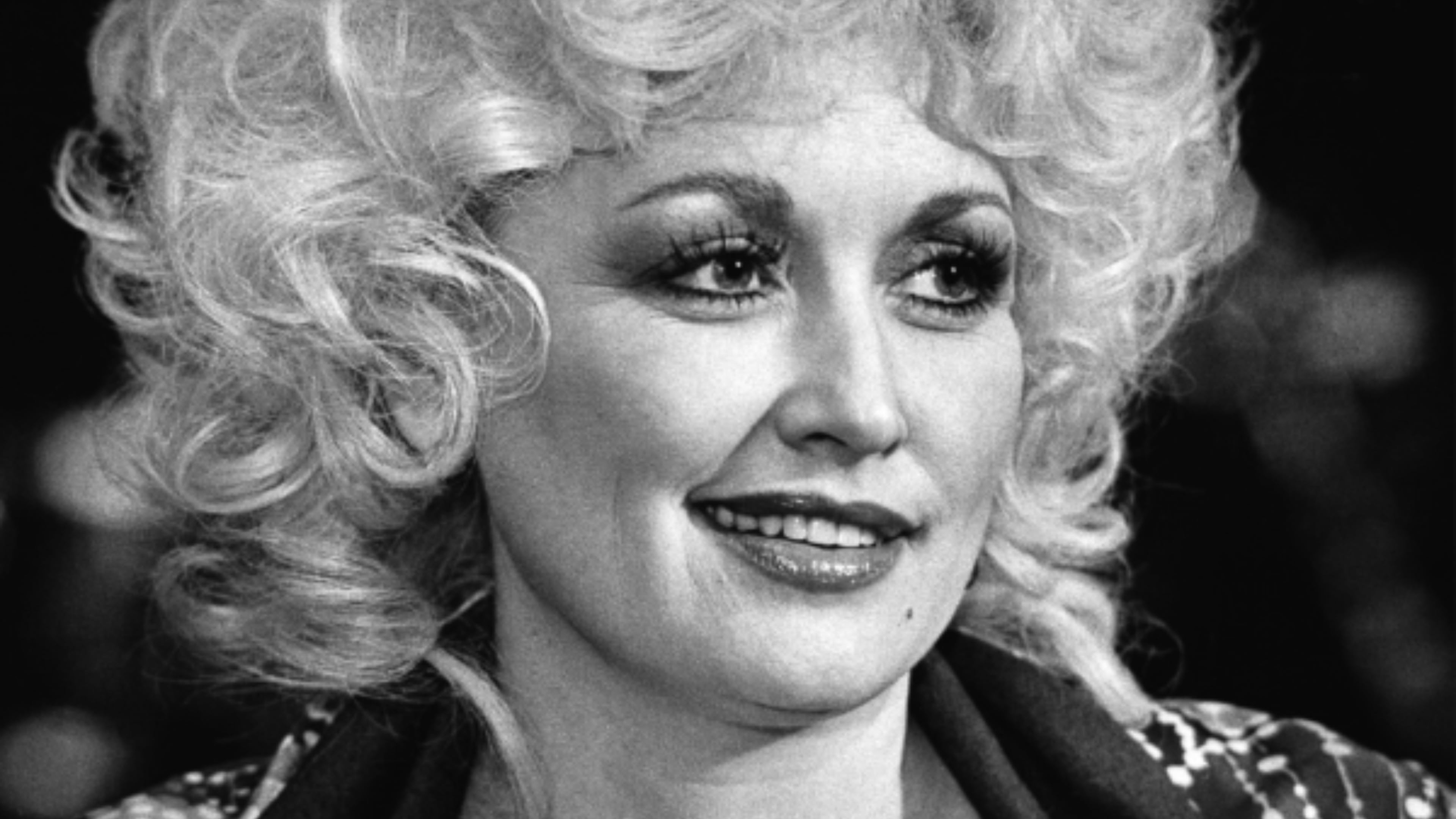 Dolly Parton, top, on Nov. 11, 1982 in Nashville and Gloria Steinem on Feb. 17, 1970 in New York. (AP Photo/Mark Humphrey, Anthony Camerano, File)