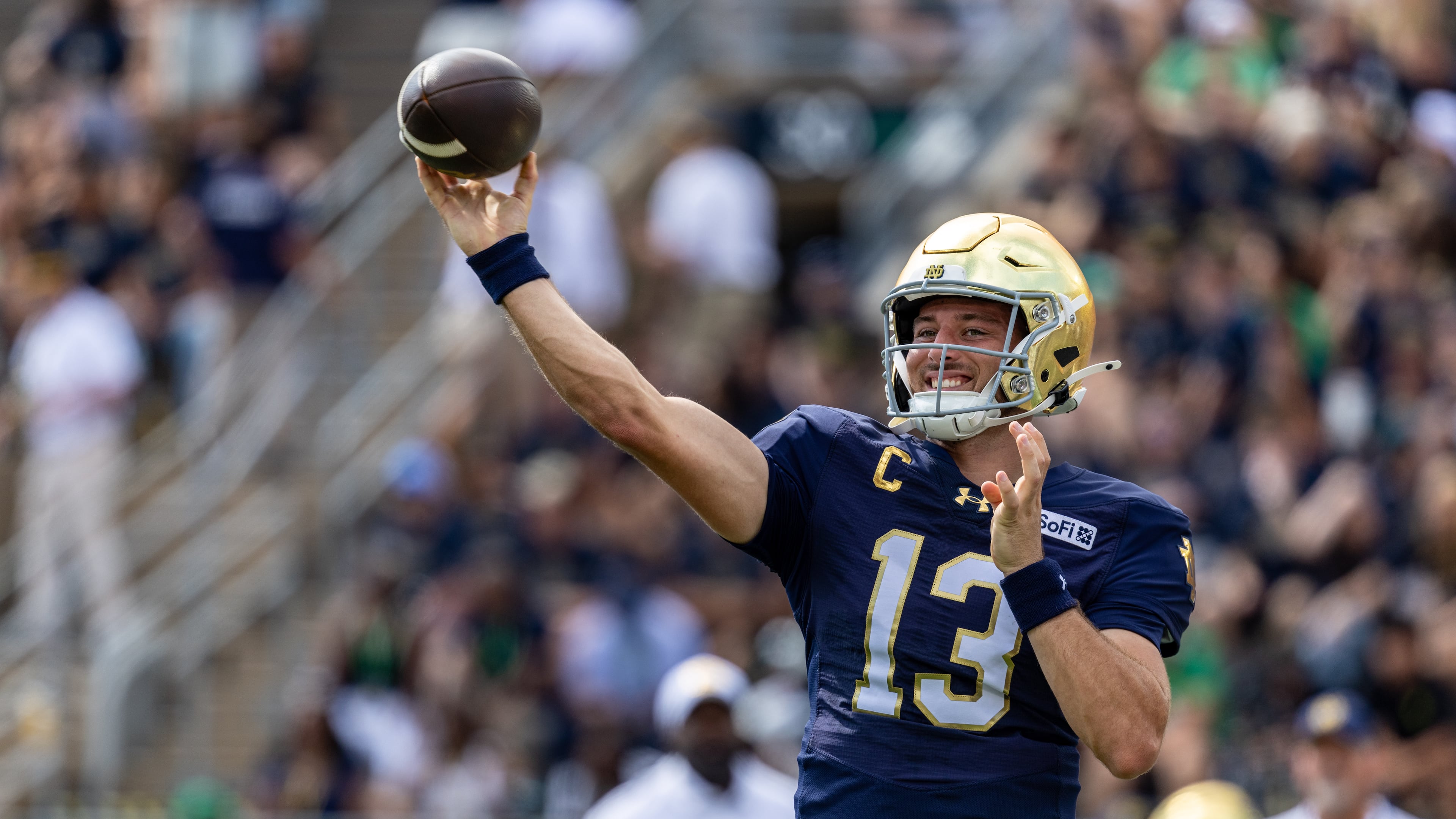 Notre Dame quarterback CJ Carr (13) throws before an NCAA college football game against Rice, Saturday, Sept. 12, 2026, in South Bend, Ind. (AP Photo/Paul Barnick)