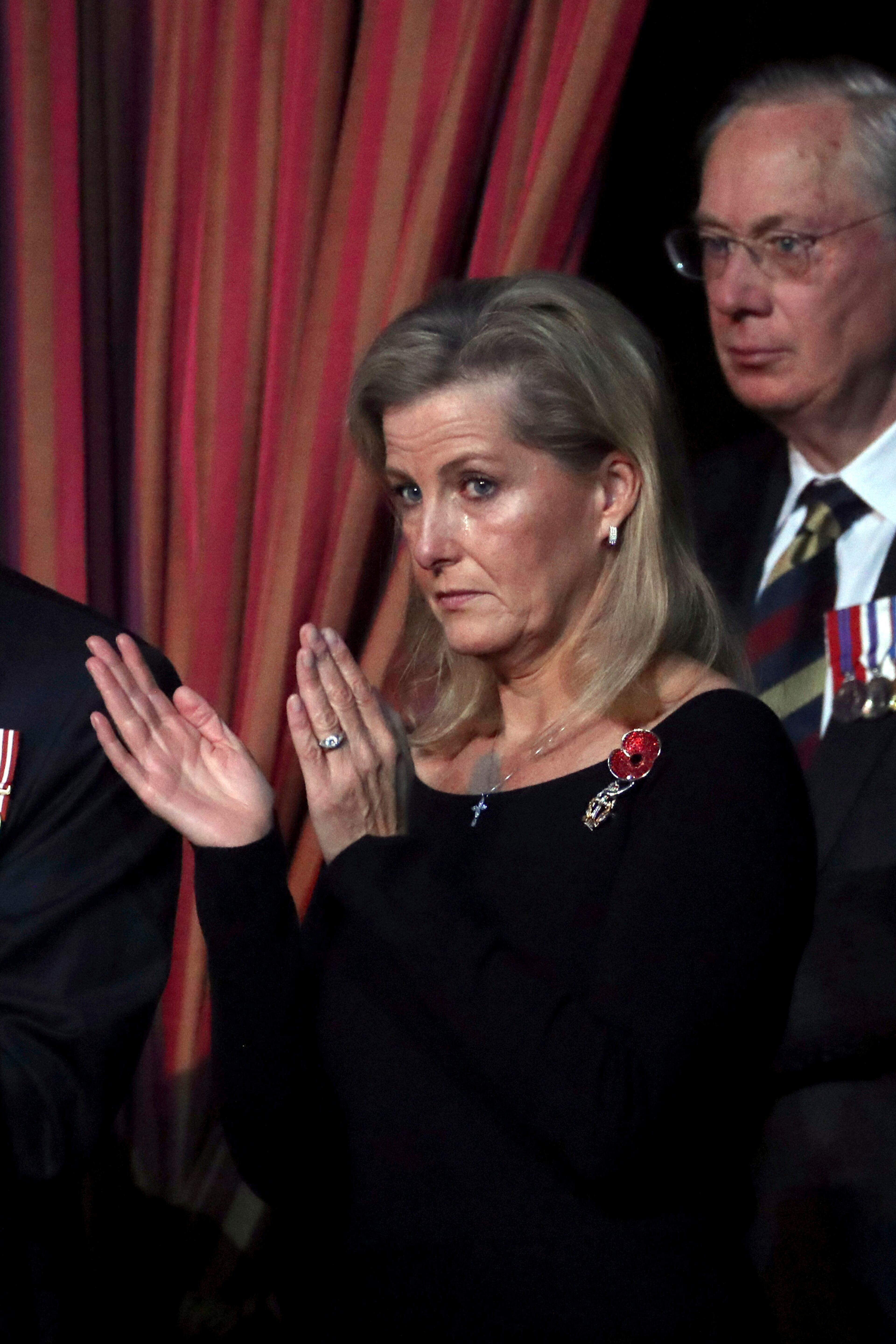 Britain's Sophie, the Countess of Wessex attends the annual Royal British Legion Festival of Remembrance, at the Royal Albert Hall in Kensington, London, Saturday, Nov. 9, 2019. In the front row is Britain's Prime Minister Boris Johnson and Carrie Symonds. (Chris Jackson/Pool Photo via AP)