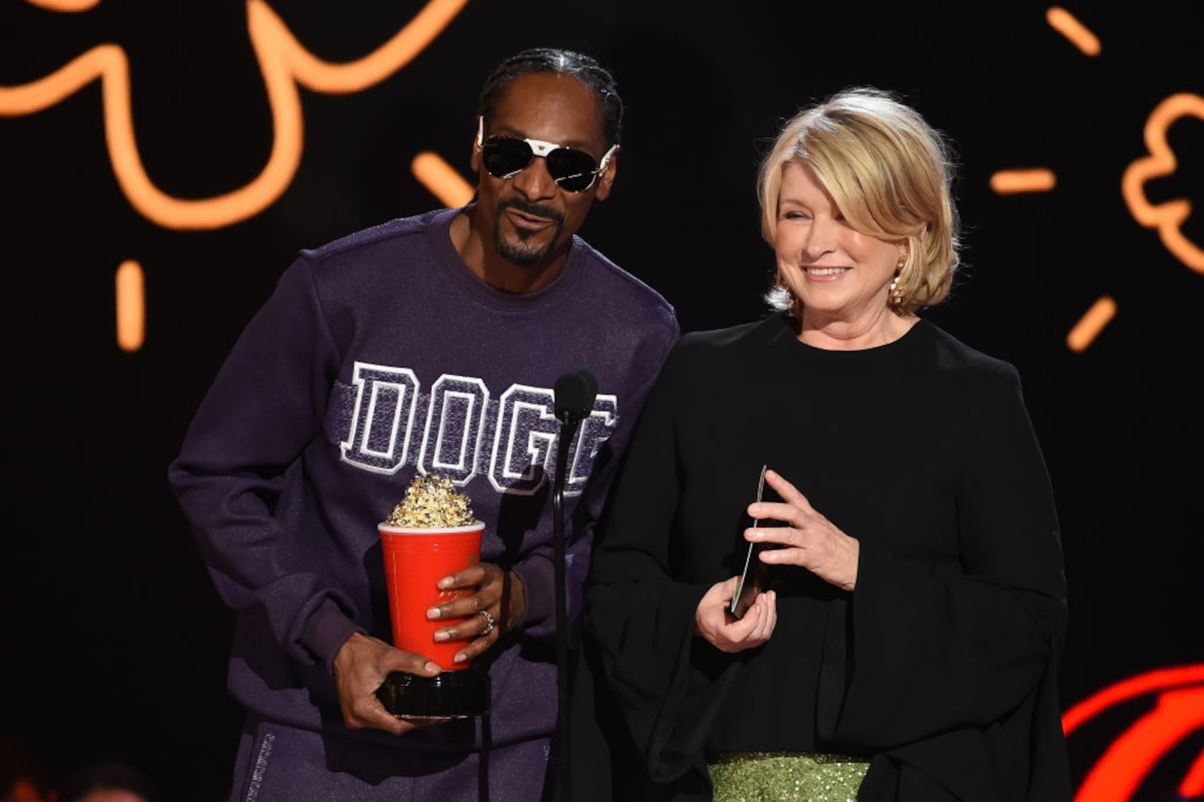 LOS ANGELES, CA - MAY 07: Rapper Snoop Dogg and Martha Stewart speak onstage during the 2017 MTV Movie And TV Awards at The Shrine Auditorium on May 7, 2017 in Los Angeles, California. (Photo by Kevin Winter/Getty Images)