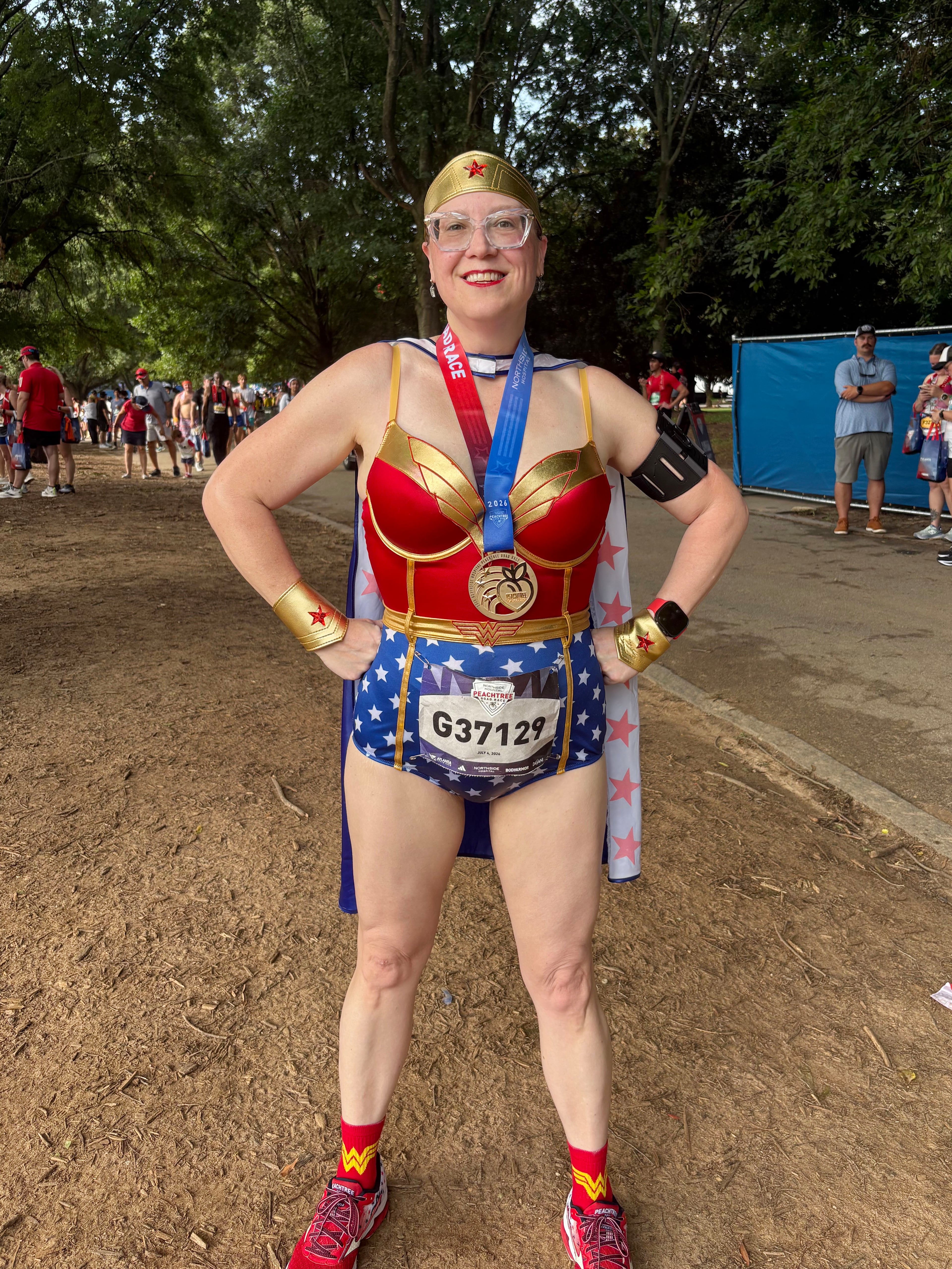 Crystal Zimmer, 47, just finished her 10th Peachtree Road Race and says she feels better than she thought she would. She chose to dress up as Wonder Woman as a tribute to Lynda Carter, the 1970s actress from the “Wonder Woman” TV show.