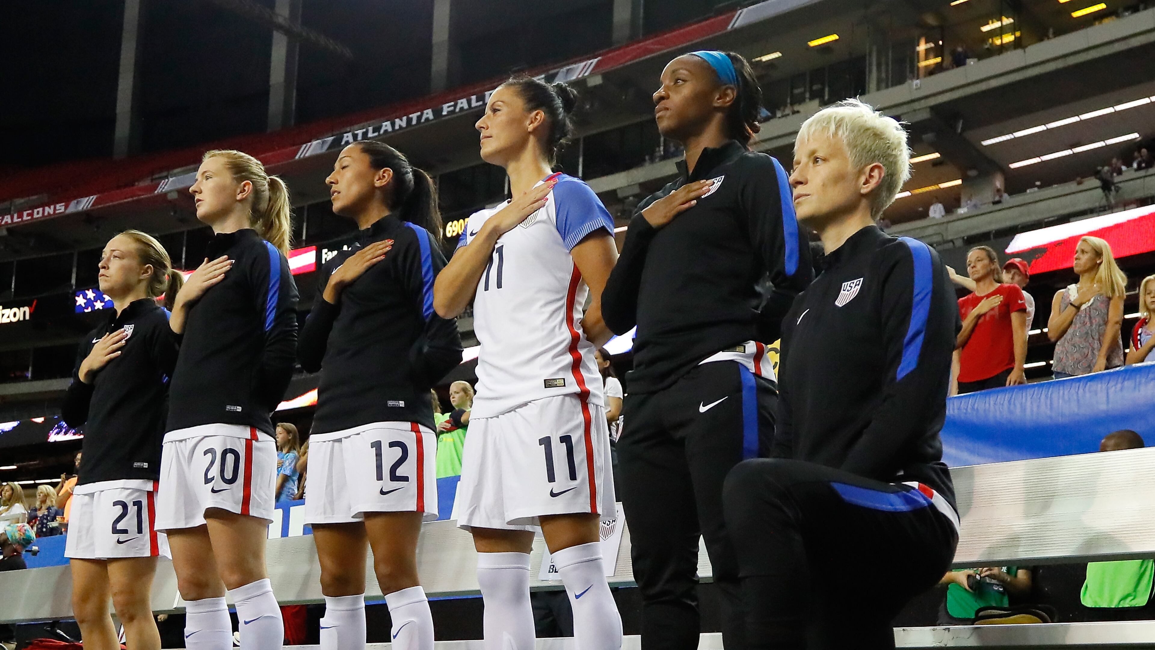 ATLANTA, GA - SEPTEMBER 18: Megan Rapinoe #15 kneels during the National Anthem prior to the match between the United States and the Netherlands at Georgia Dome on September 18, 2016 in Atlanta, Georgia. US Soccer has a new policy that requires all players to stand for the anthem. (Photo by Kevin C. Cox/Getty Images)