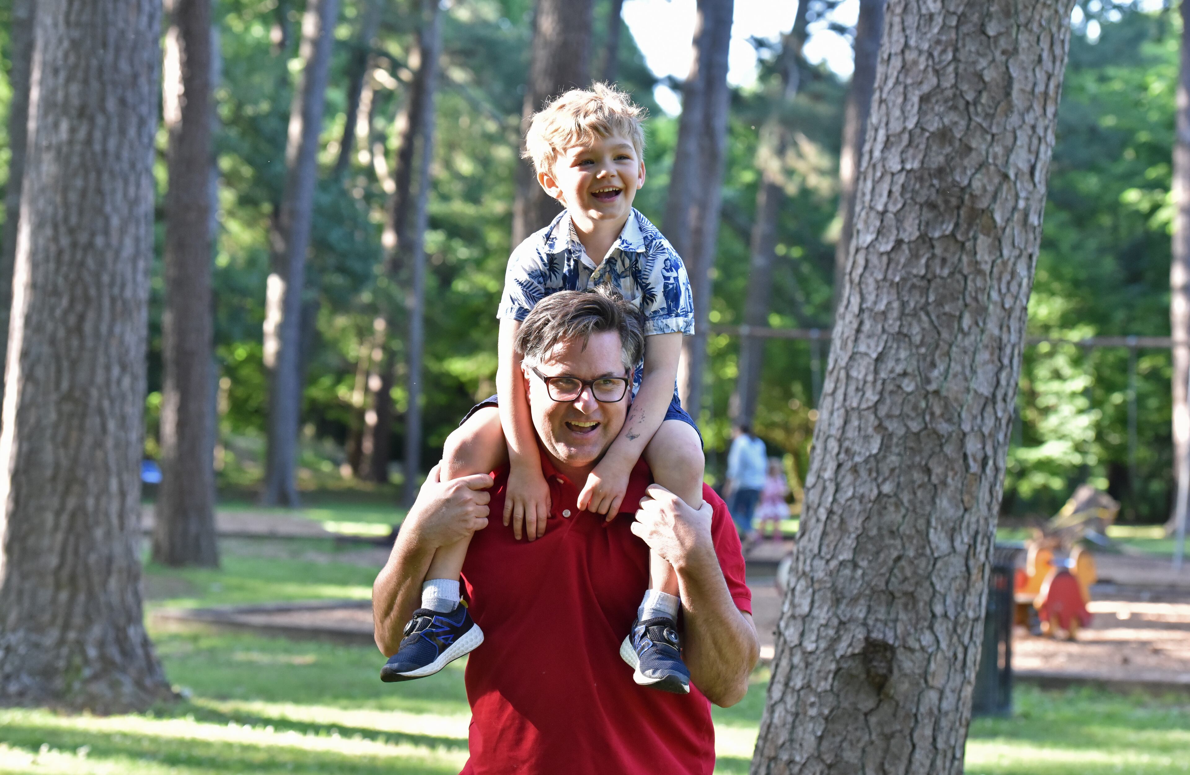 May 14, 2019 Atlanta - "Daddy K" gives 4-year-old Owen a boost during a day in the park. HYOSUB SHIN / HSHIN@AJC.COM