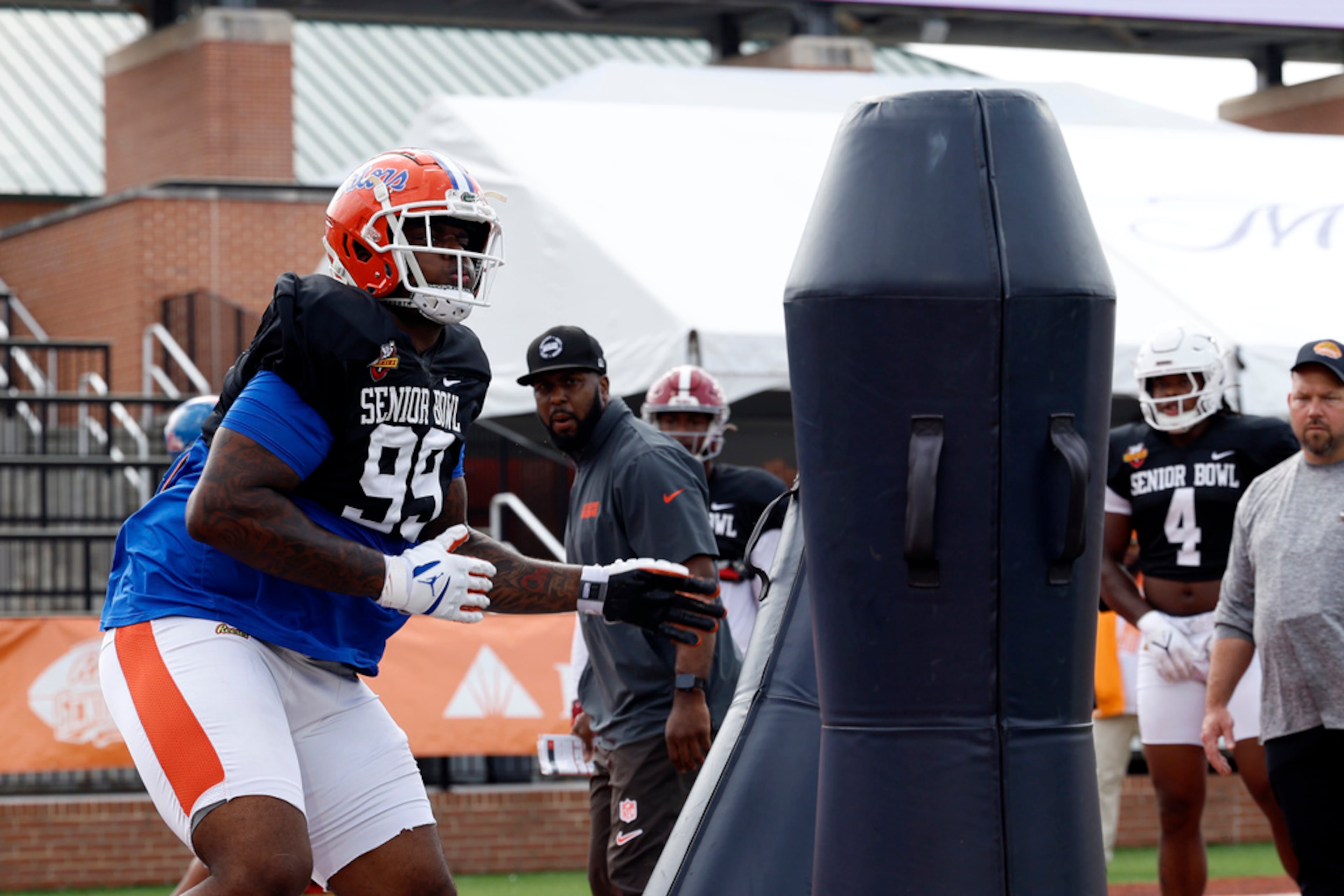 American team defensive lineman Cam'Ron Jackson of Florida (99) runs through drills during practice for the Senior Bowl NCAA college football game, Thursday, Jan. 30, 2025, in Mobile, Ala. (AP Photo/Butch Dill)