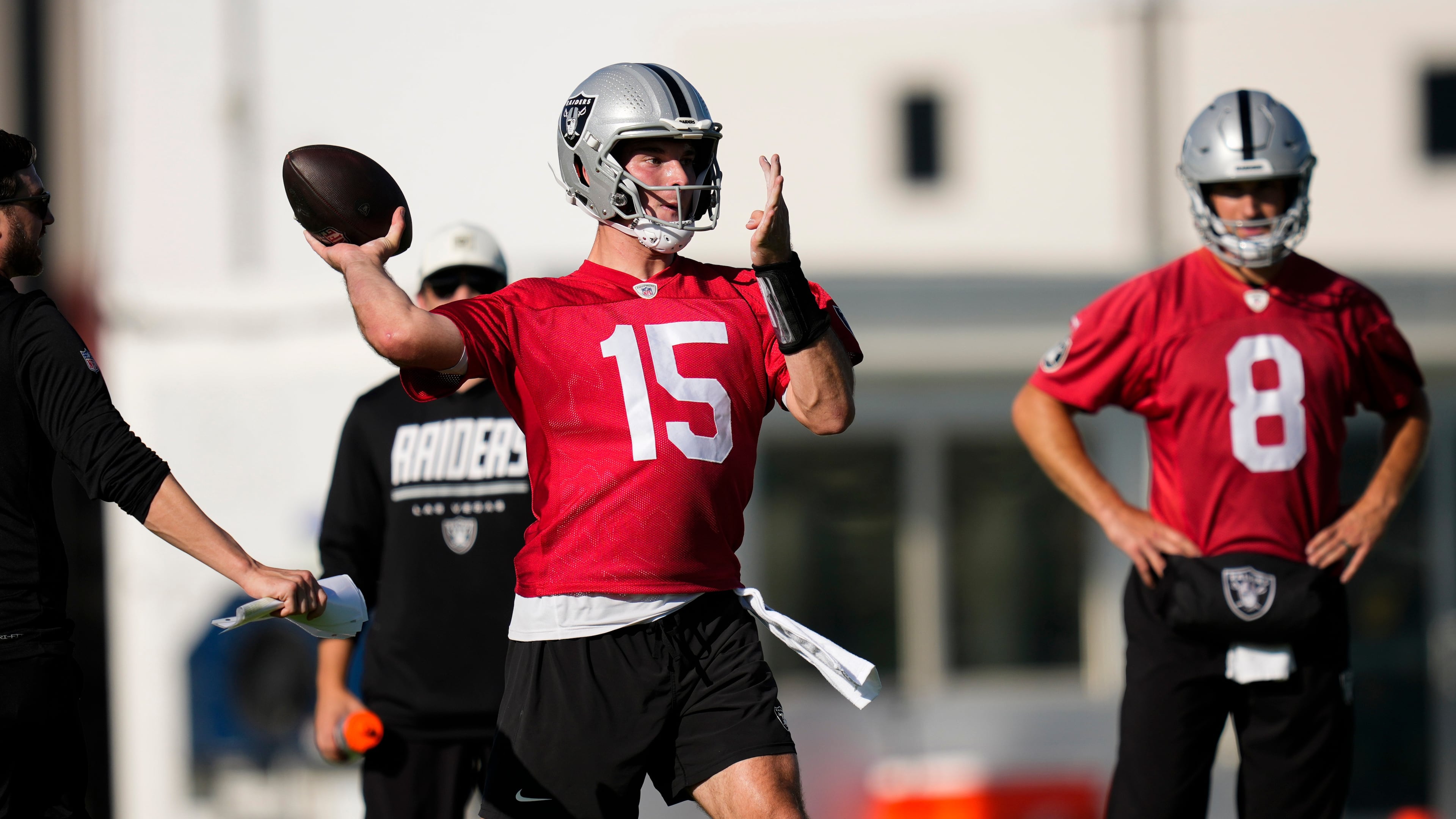 Las Vegas Raiders quarterback Fernando Mendoza (15) runs through a drill during practice at the team's NFL football training camp, Wednesday, July 29, 2026, in Henderson, Nev. (AP Photo/Lucas Peltier)