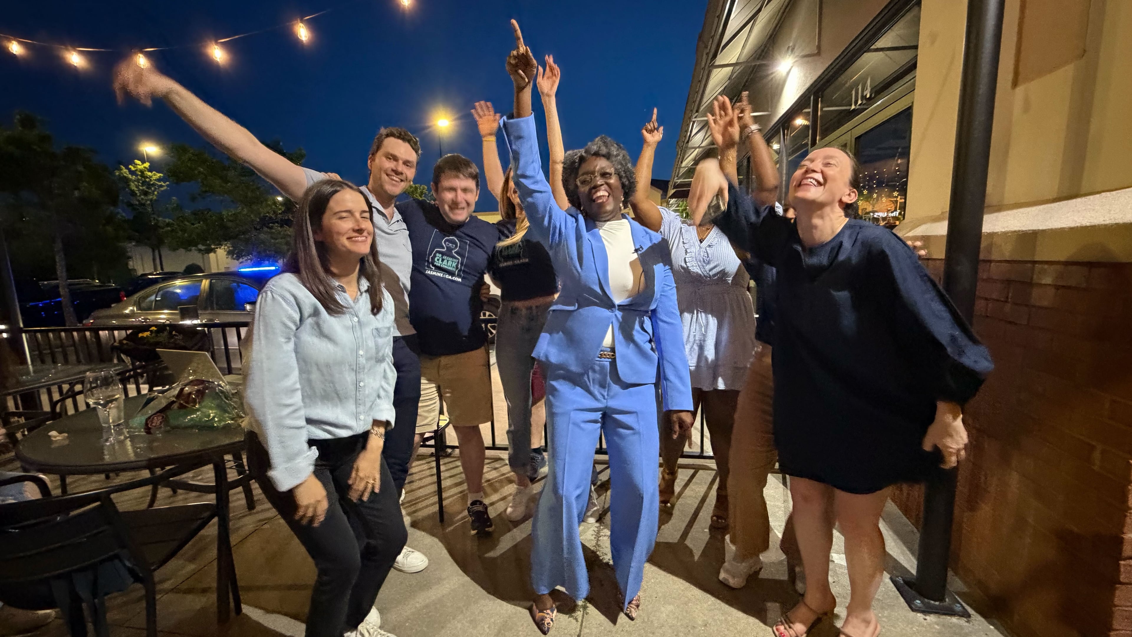 State Rep. Jasmine Clark and staff react to news that she is the likely winner on the Democratic ticket for U.S. House District 13 at her election night watch party at Fresca Trattoria in Stone Mountain on Tuesday, May 19, 2026. (Gavin Godfrey/AJC)