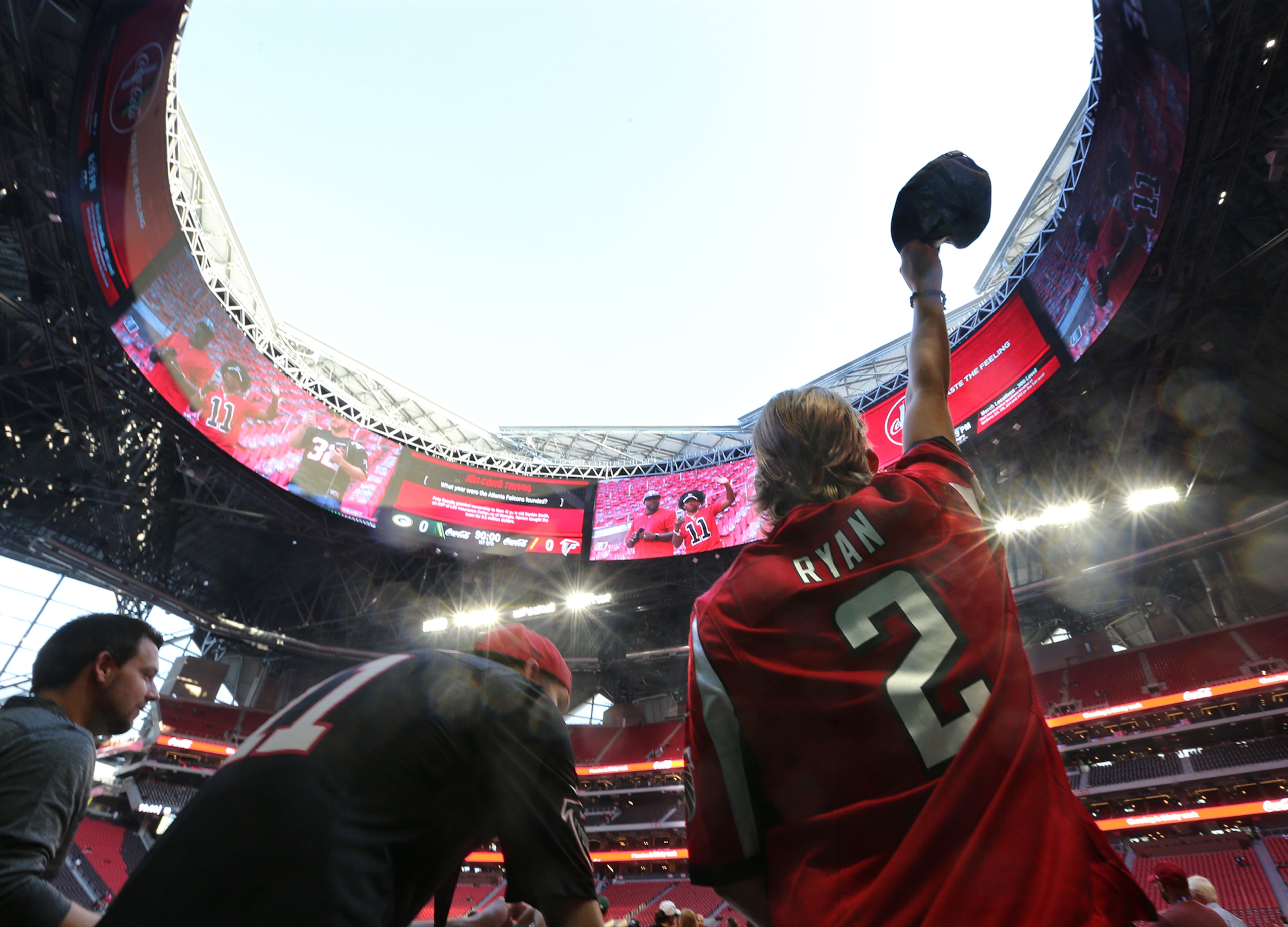 September 17, 2017 Atlanta: Colton Holder, Snellville, waves his cap beneath the open roof of Mercedes-Benz Stadium as the Falcons prepare to play the Packers in a NFL football game on Sunday, September 17, 2017, in Atlanta. Curtis Compton/ccompton@ajc.com