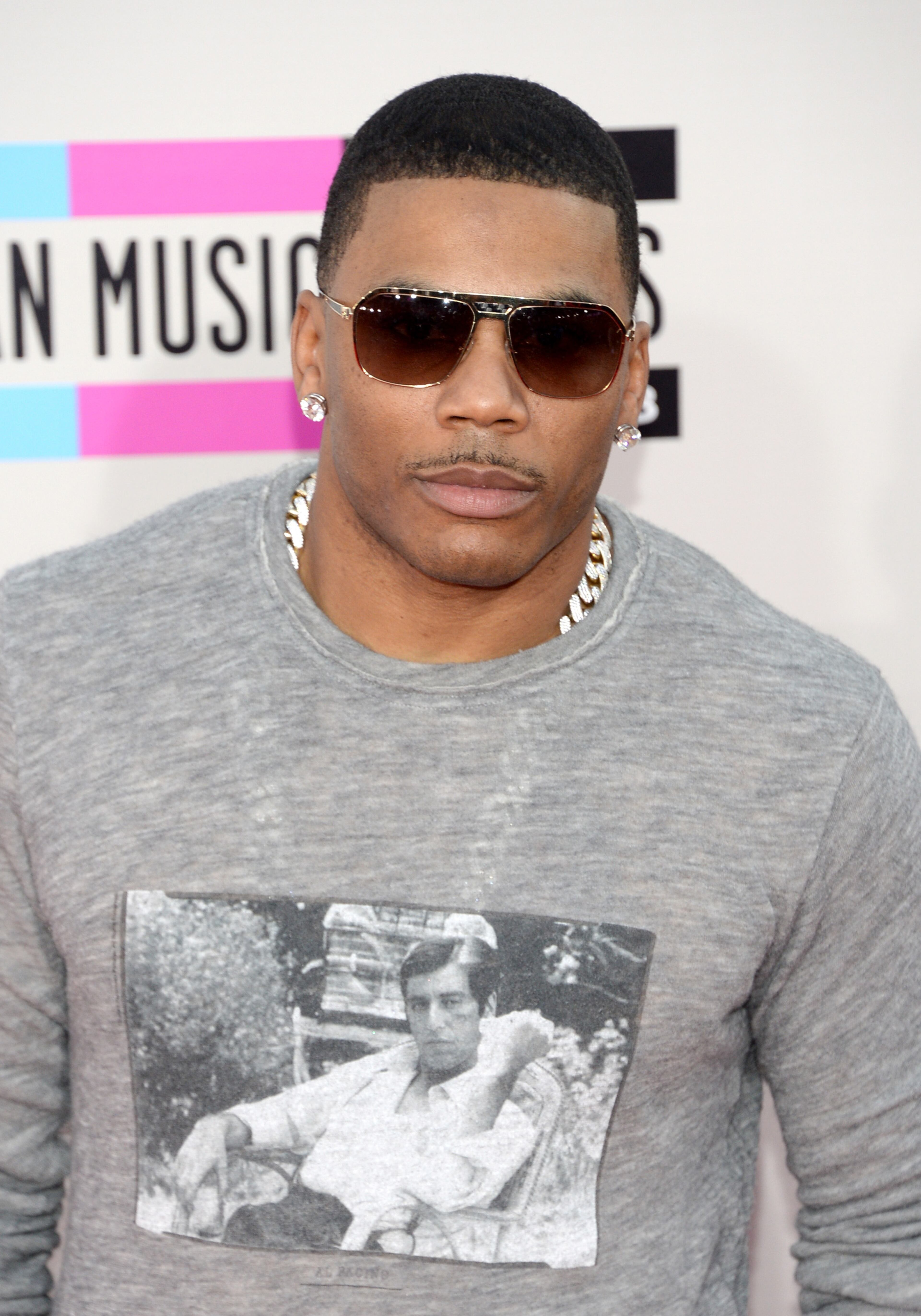 LOS ANGELES, CA - NOVEMBER 24: Rapper Nelly attends the 2013 American Music Awards at Nokia Theatre L.A. Live on November 24, 2013 in Los Angeles, California. (Photo by Jason Kempin/Getty Images)