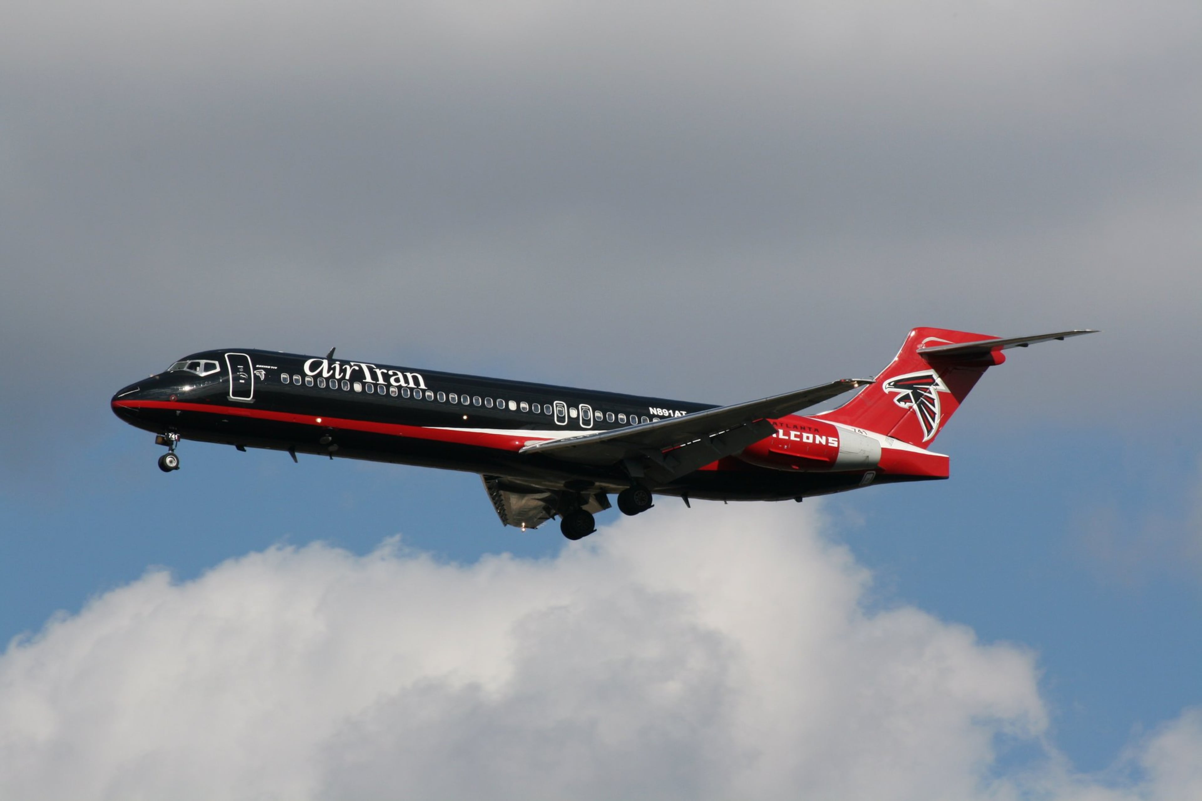Norbert Raith of Jonesboro took this photo at Hartsfield-Jackson International Airport in 2011. Back in 2009 AirTran Airways named a Boeing 717 ‘Falcons 1.’ It was the first time in the company’s history that an aircraft had been co-branded from nose to tail. Falcons 1 operated across AirTran’s network of more than 60 destinations. The partnership included joint promotions, prominent signage at the Georgia Dome, billboards and other advertising featuring Falcon players in full uniform.