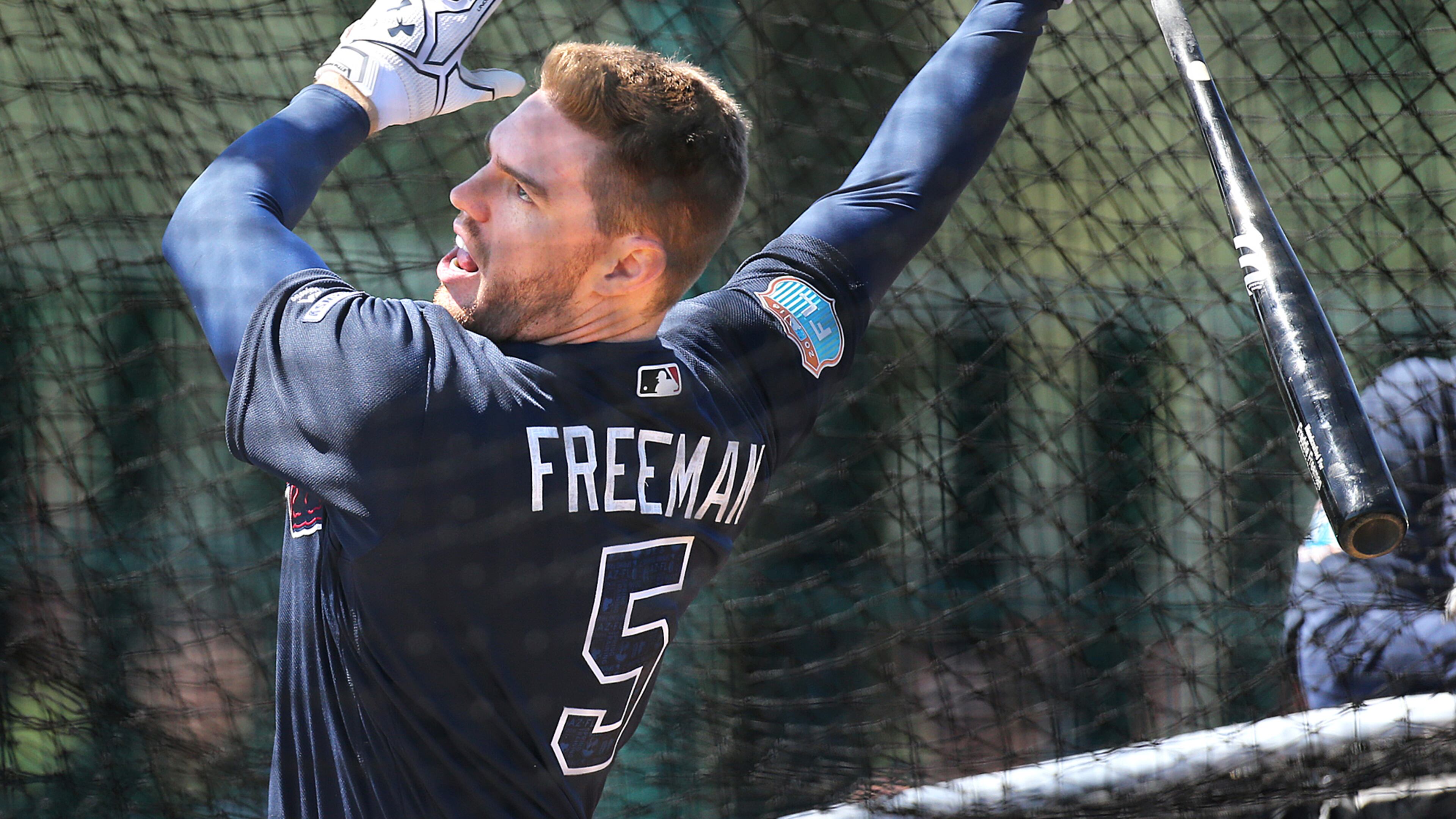 Braves first baseman Freddie Freeman hits during batting practice at spring training at Disney’s Wide World of Sports. Freeman said he has never wavered in his commitment to the Braves during their makeover. (Curtis Compton/ccompton@ajc.com)