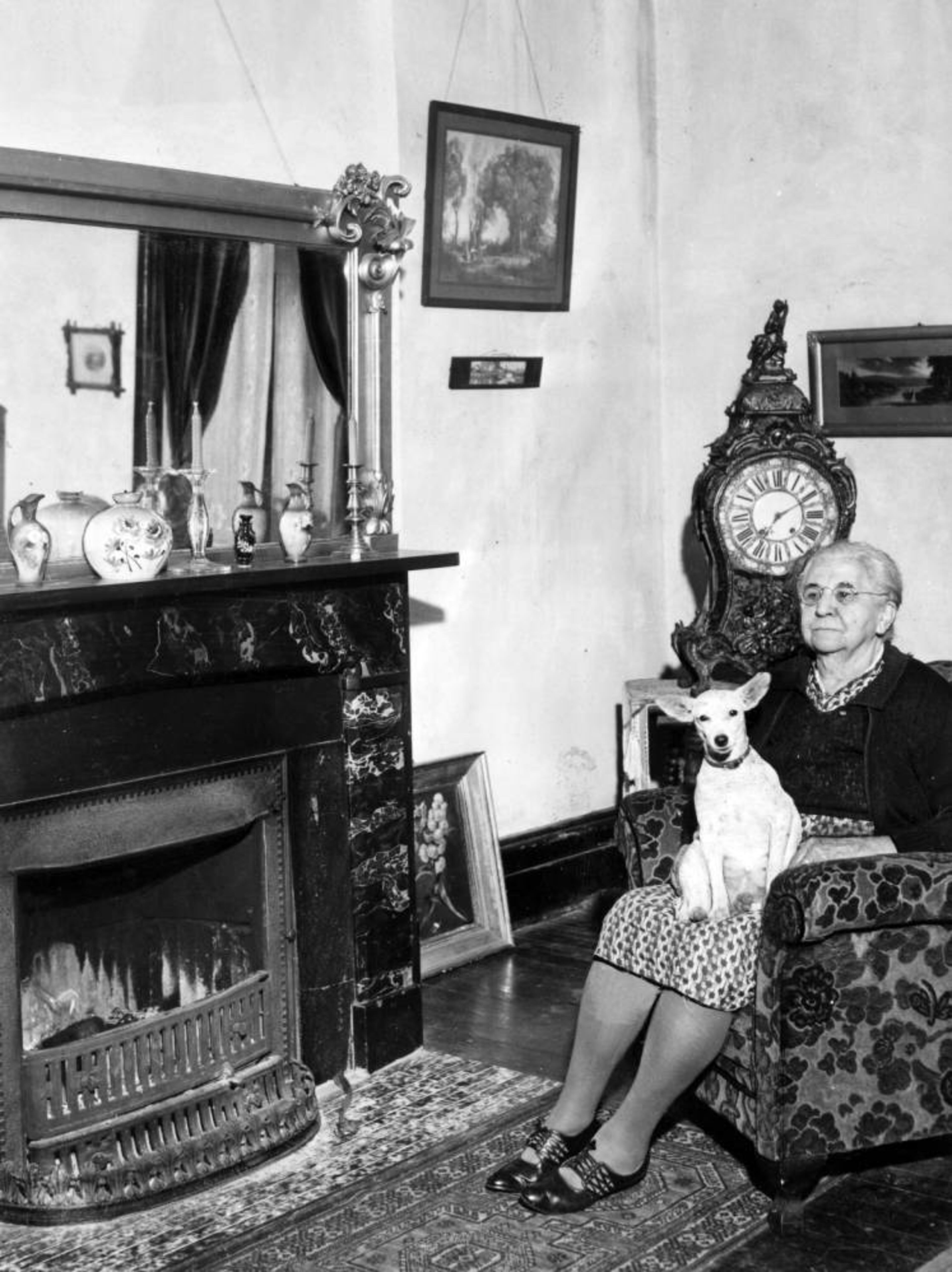 Mrs. Addie Saylor sitting in the former Billiards room at Barnsley Gardens, near Adairsville, Bartow County, Georgia, January 1942. AJCP566-019c, Atlanta Journal-Constitution Photographic Archives. Special Collections and Archives, Georgia State University Library.