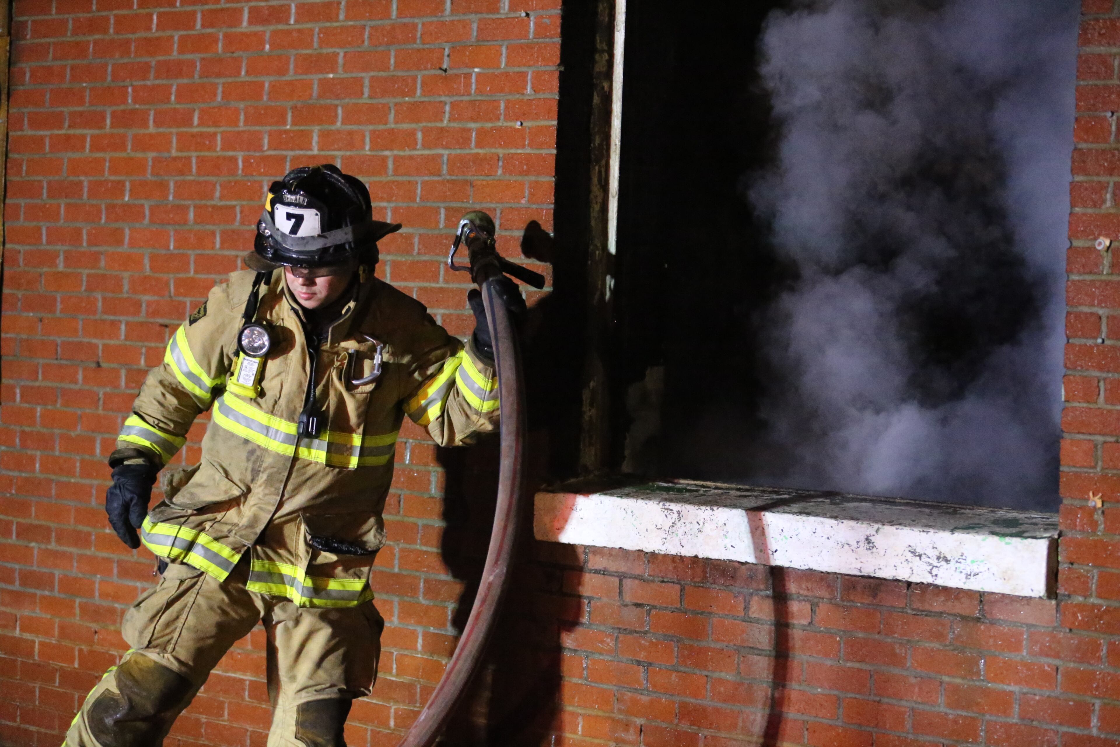 Fire broke out around 2:45 a.m. in the former Hooper Alexander Elementary School on Memorial Drive at Rupert Drive in DeKalb. The school closed in 2008, and was boarded up.