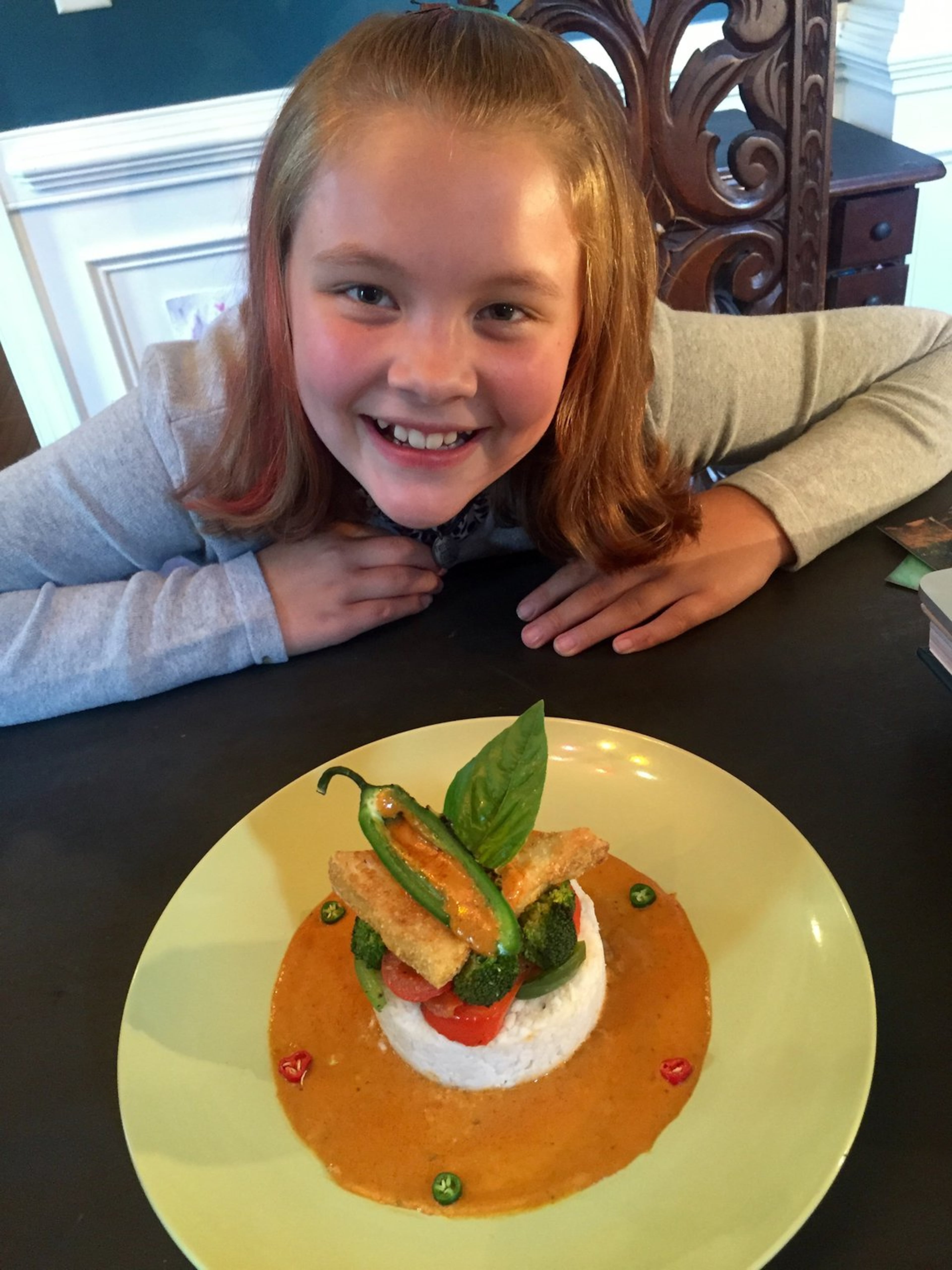 Violet Waterhouse poses with her signature dish, deconstructed Panang curry with tofu, while auditioning for Food Network’s “Chopped Junior.” CONTRIBUTED BY JON WATERHOUSE