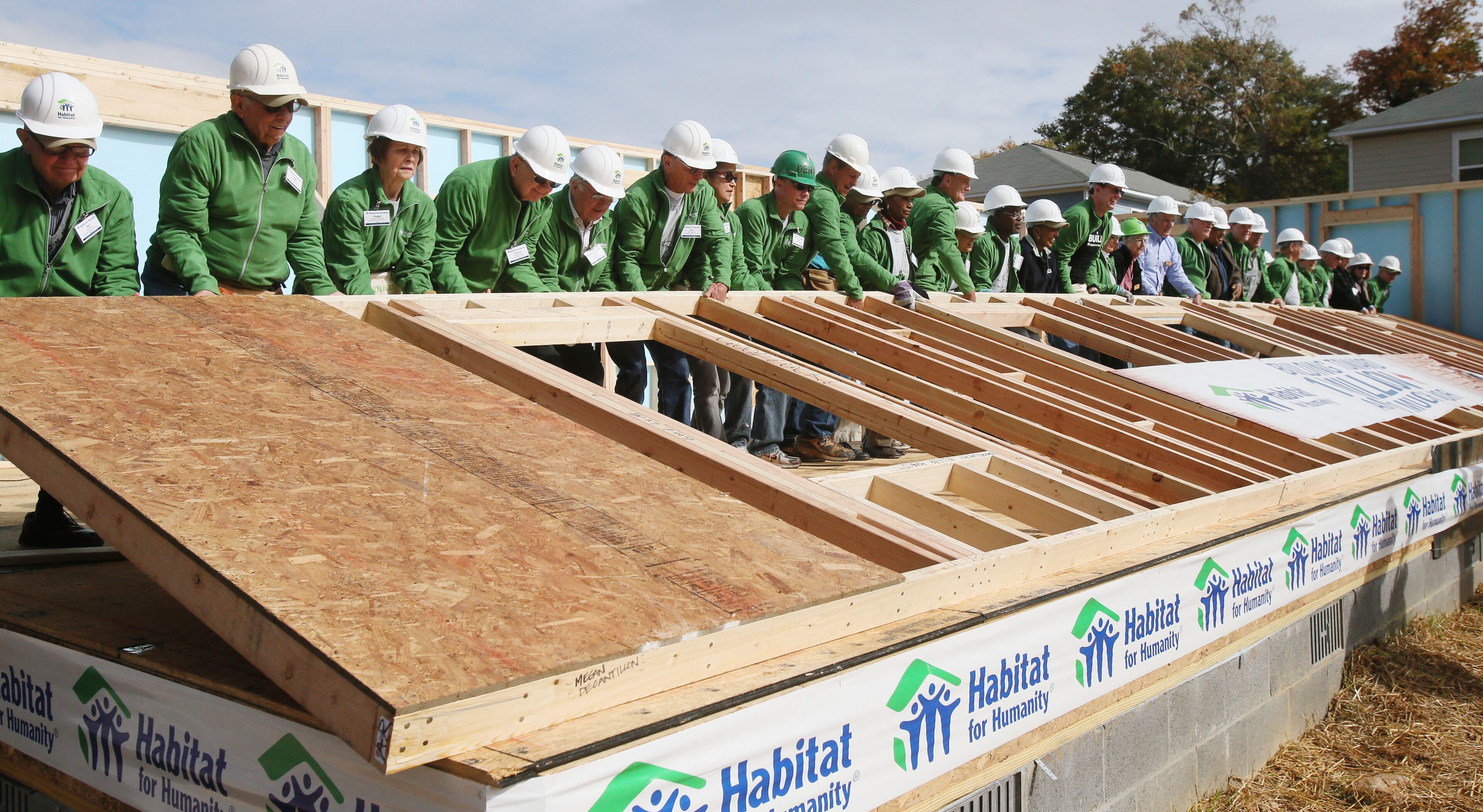 Past and present Habitat for Humanity International Board members raise the walls on the 800,000th house that the organization has built, rehabilitated or repaired worldwide. According the the organization, an estimated 4 million people have improved their living conditions through Habitat's housing solutions since the organization was founded in 1976. The milestone home is located in Atlanta Habitat's neighborhood of Verbena Place, where 14 homes have been built by Atlanta Habitat for Humanity, with plans to construct 38 more. Habitat for Humanity says it is on track to build, renovate, repair or improve 1 million homes by the end of 2015.