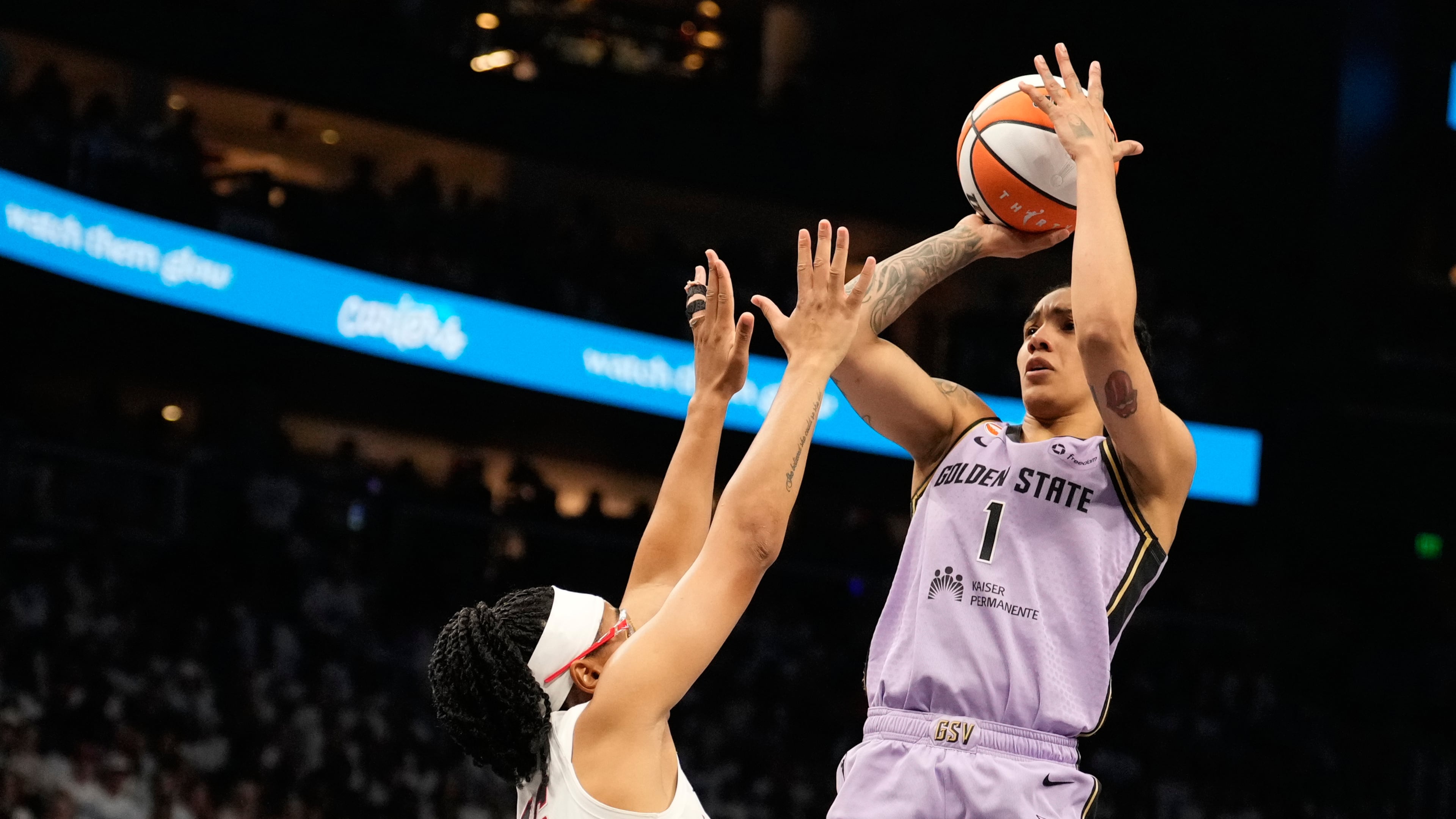 Golden State Valkyries forward Gabby Williams (1) shoots against Atlanta Dream guard Allisha Gray (15) during Game 4 of the WNBA basketball finals on Saturday, Oct. 24, 2026, in Atlanta. (AP Photo/Brynn Anderson)