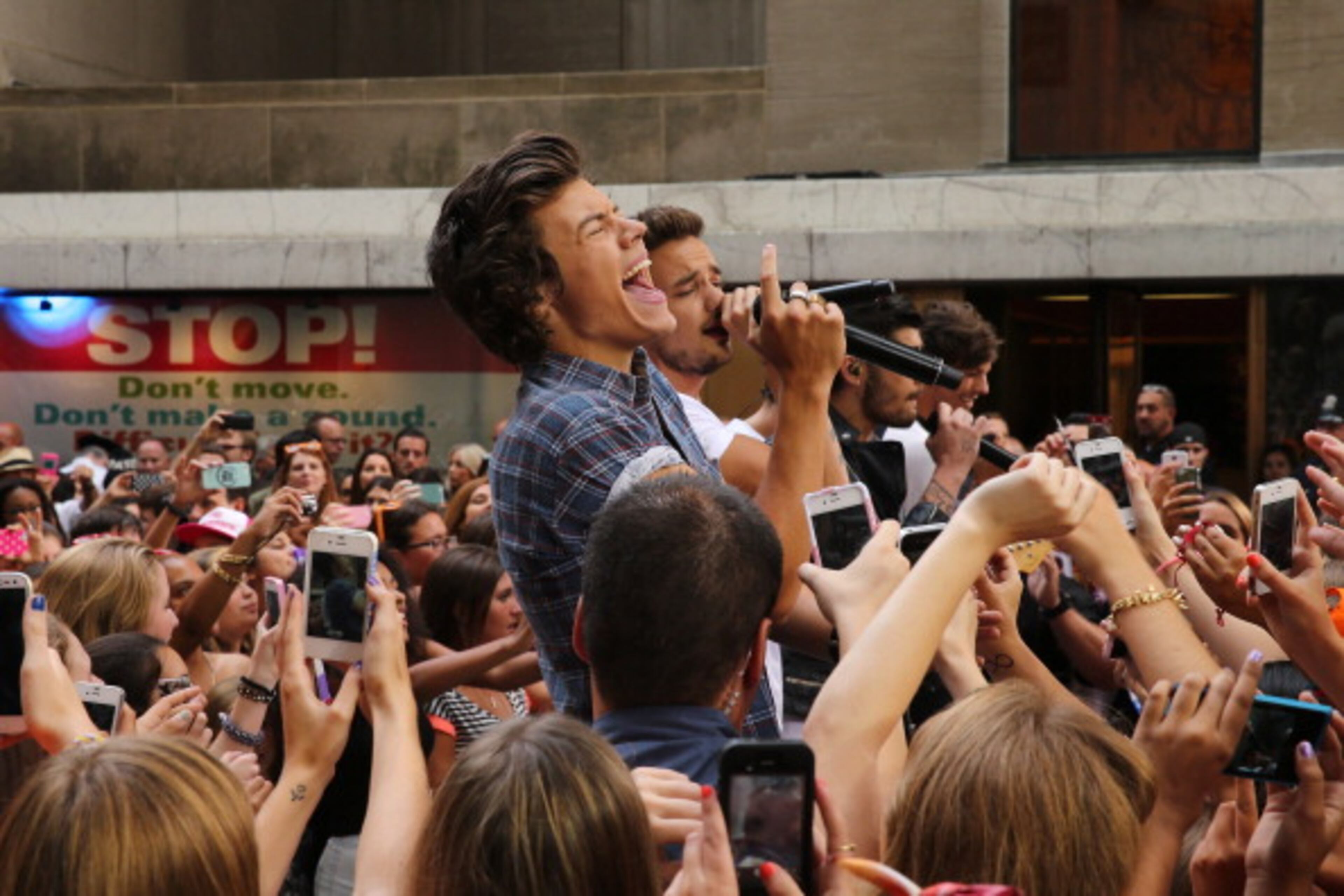 NEW YORK, NY - AUGUST 23: Singer Harry Styles from One Direction performs on stage on NBC's "Today" at Rockefeller Center on August 23, 2013 in New York City. (Photo by Neilson Barnard/Getty Images)