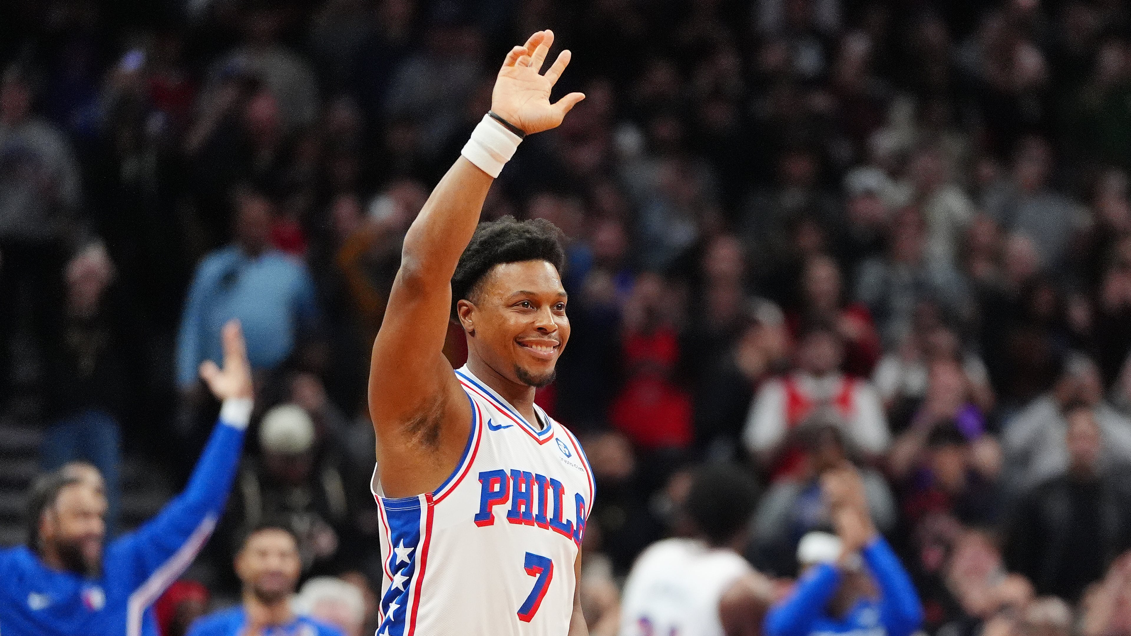 Philadelphia 76ers guard Kyle Lowry (7) acknowledges the fans as he is brought in during the final minutes of an NBA basketball game against his former team, the Toronto Raptors, in Toronto, Monday, Jan. 12, 2026. (Frank Gunn/The Canadian Press via AP)