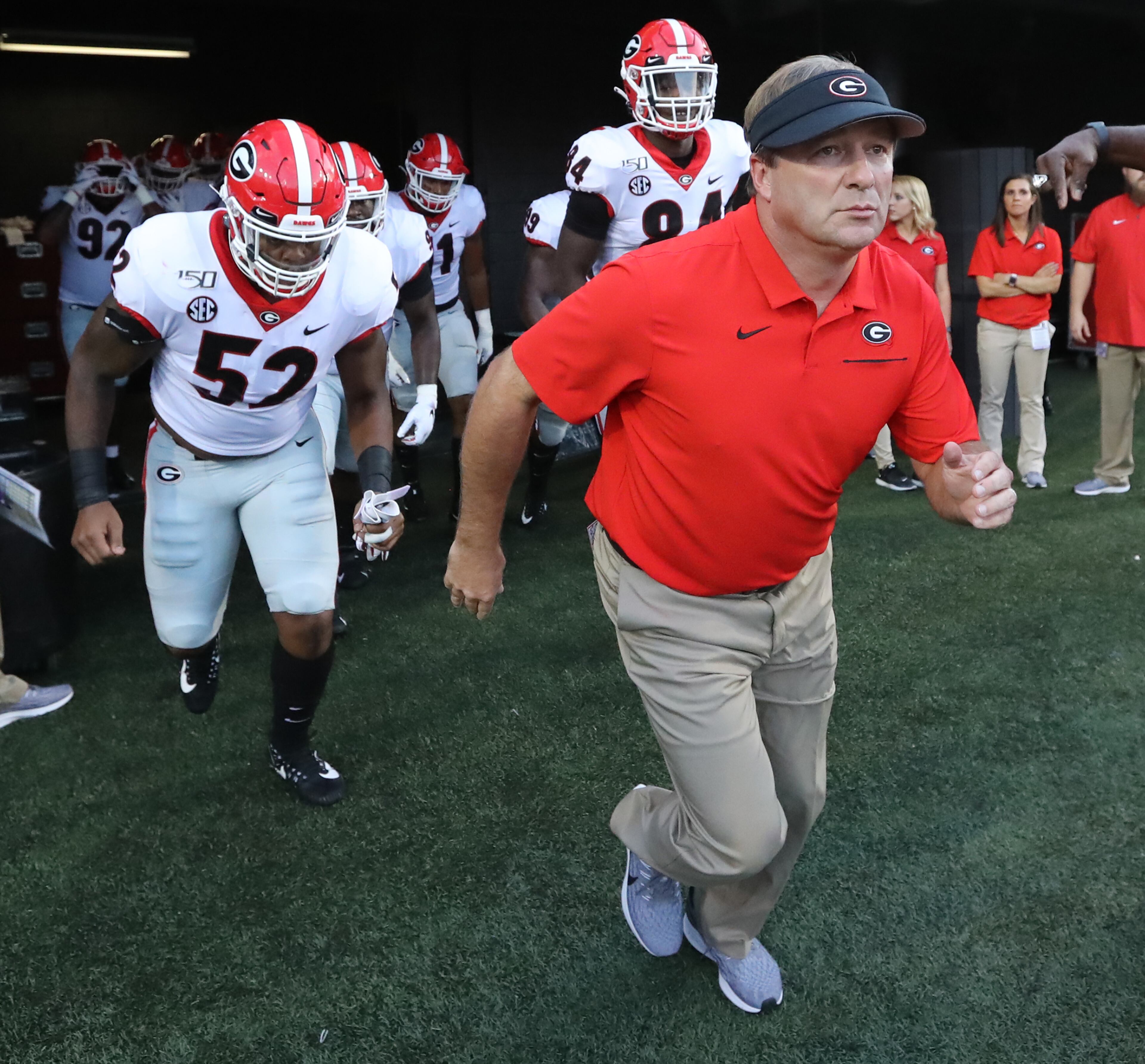 Georgia head coach Kirby Smart and his team take the field to play Vanderbilt during the first quarter in a NCAA college football game on Saturday, August 31, 2019, in Nashville. Curtis Compton/ccompton@ajc.com