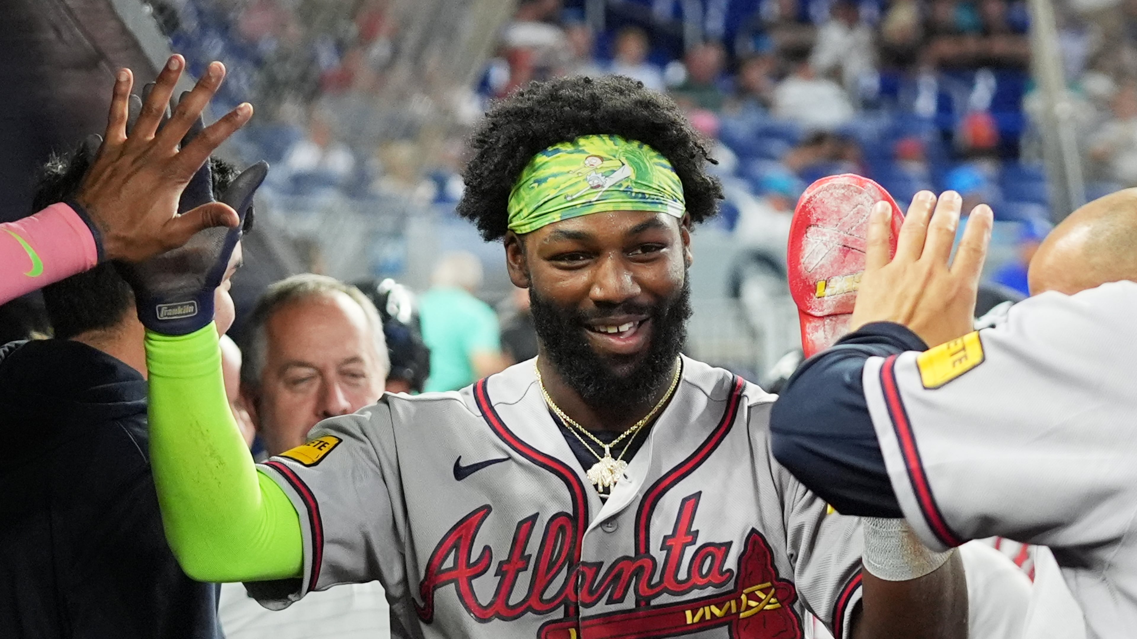 Atlanta Braves' Michael Harris II is congratulated after scoring on a sacrifice fly hit by Matt Olson during the first inning of a baseball game against the Miami Marlins, Saturday, Sept. 26, 2026, in Miami. (Lynne Sladky/AP)