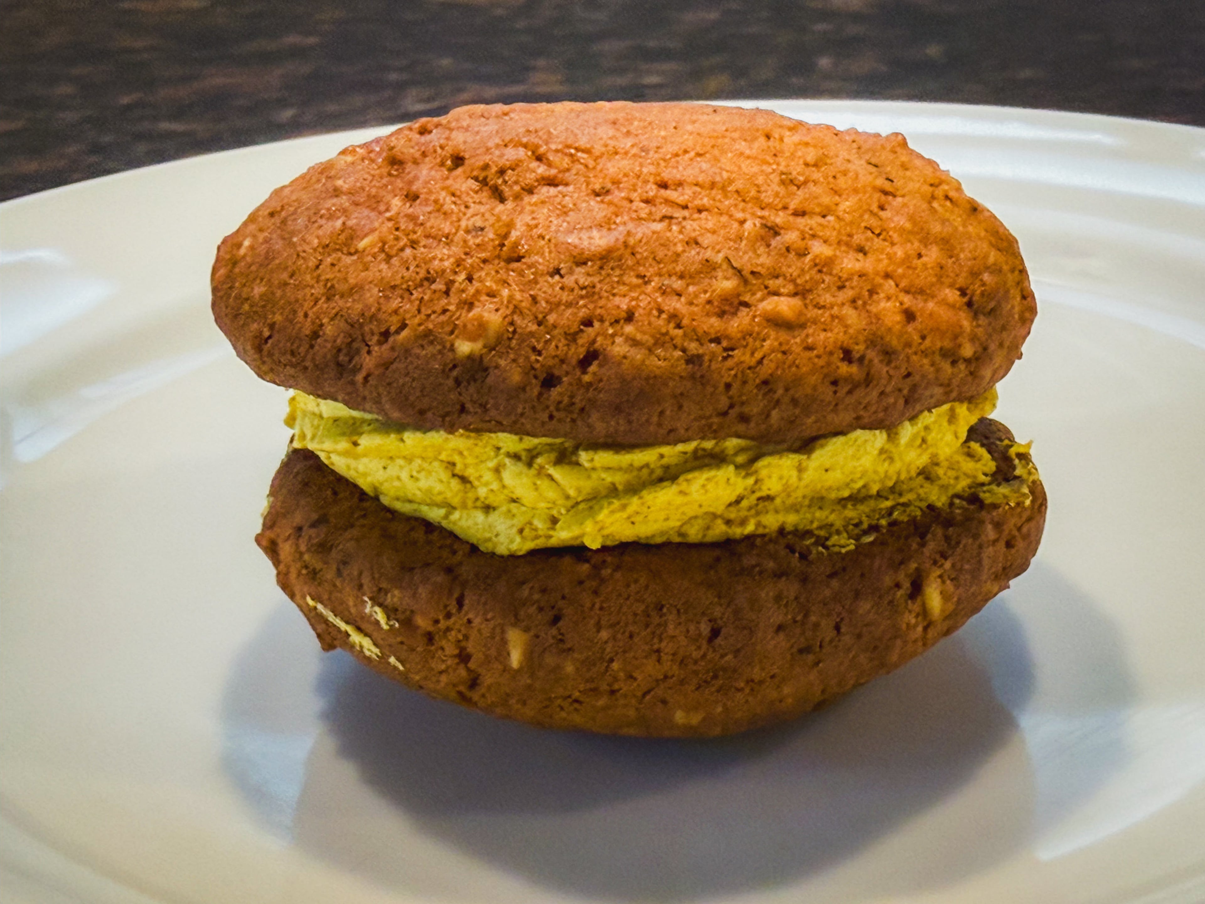 A vegan golden milk oatmeal cream pie from Raani Coffee Roasters. (Henri Hollis/AJC)