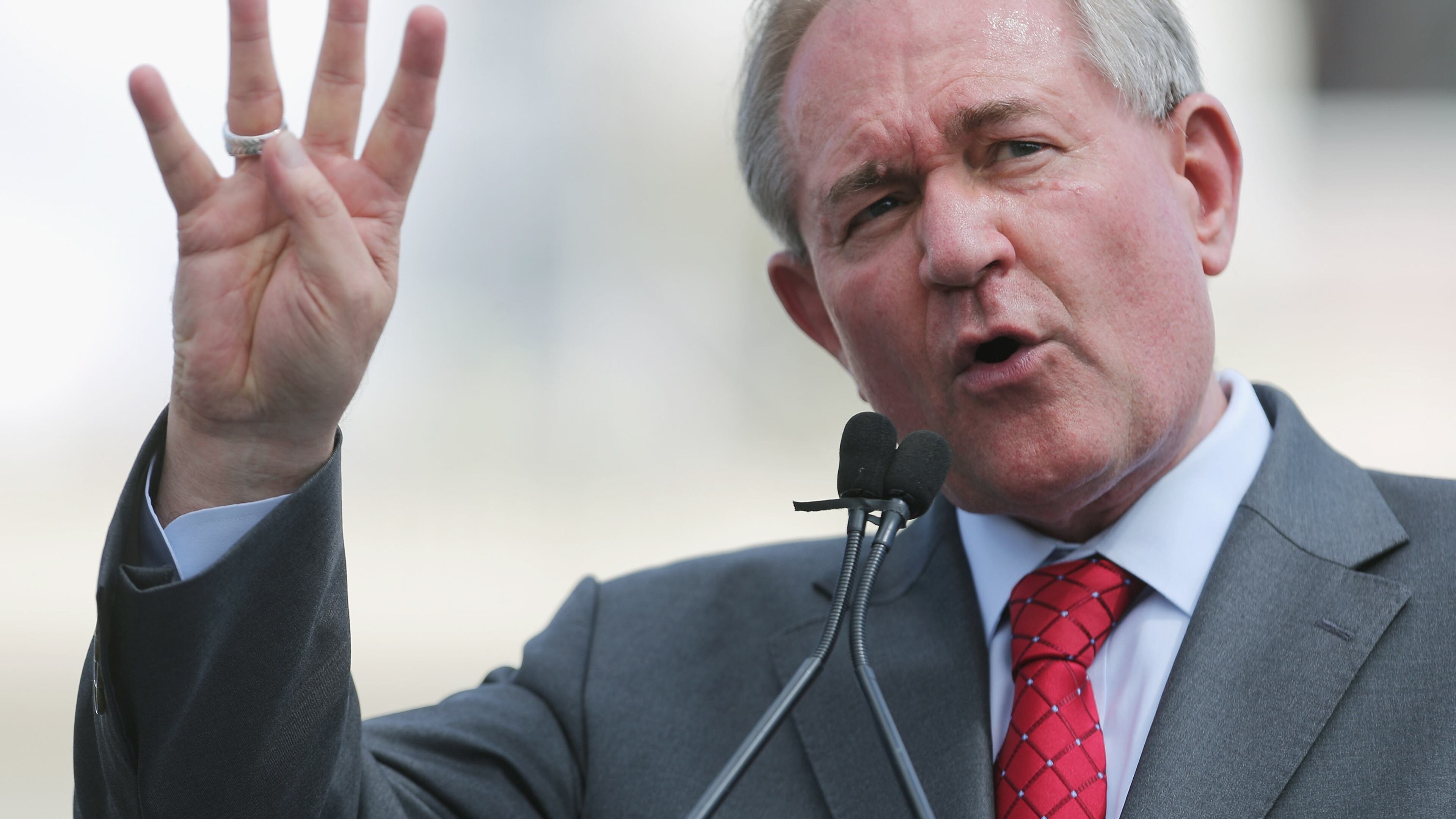 Republican presidential candidate Jim Gilmore addresses a rally against the Iran nuclear deal on the West Lawn of the U.S. Capitol September 9, 2015 in Washington, DC. Thousands of people gathered for the rally, organized by the Tea Party Patriots, which featured conservative pundits and politicians. (Photo by Chip Somodevilla/Getty Images)