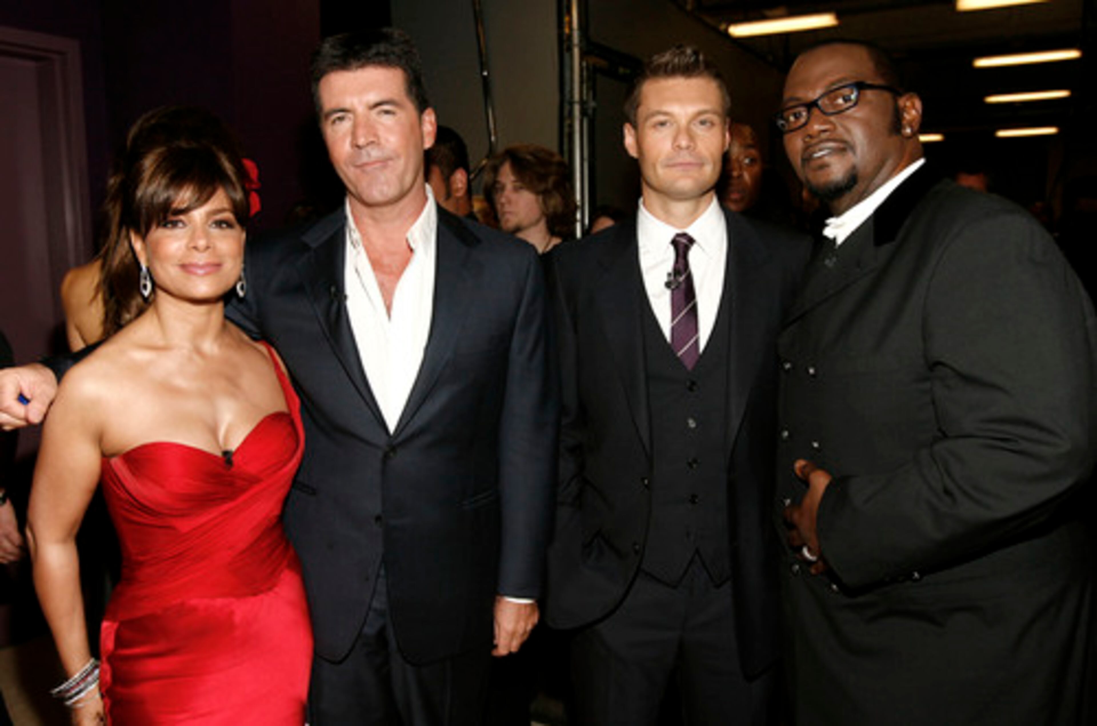 THE QUARTET that makes "American Idols," Paula Abdul, Simon Cowell, Ryan Seacrest and Randy Jackson, gather backstage. The show airs Wednesday.