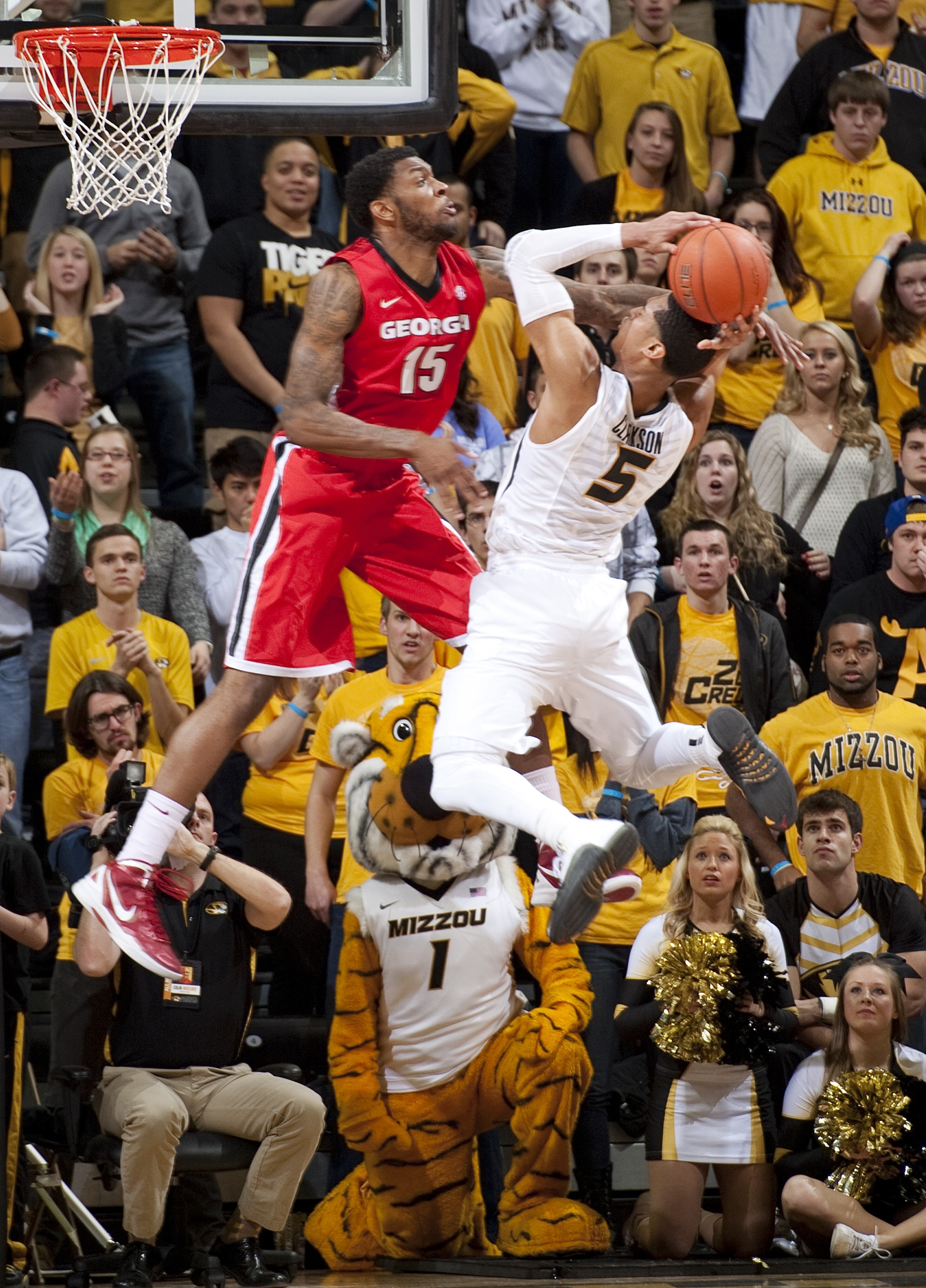 Georgia's Donte' Williams, left, fouls Missouri's Jordan Clarkson late in overtime of an NCAA college basketball game Wednesday, Jan. 8, 2014, in Columbia, Mo. Georgia won the game 70-64 in overtime. (AP Photo/L.G. Patterson)