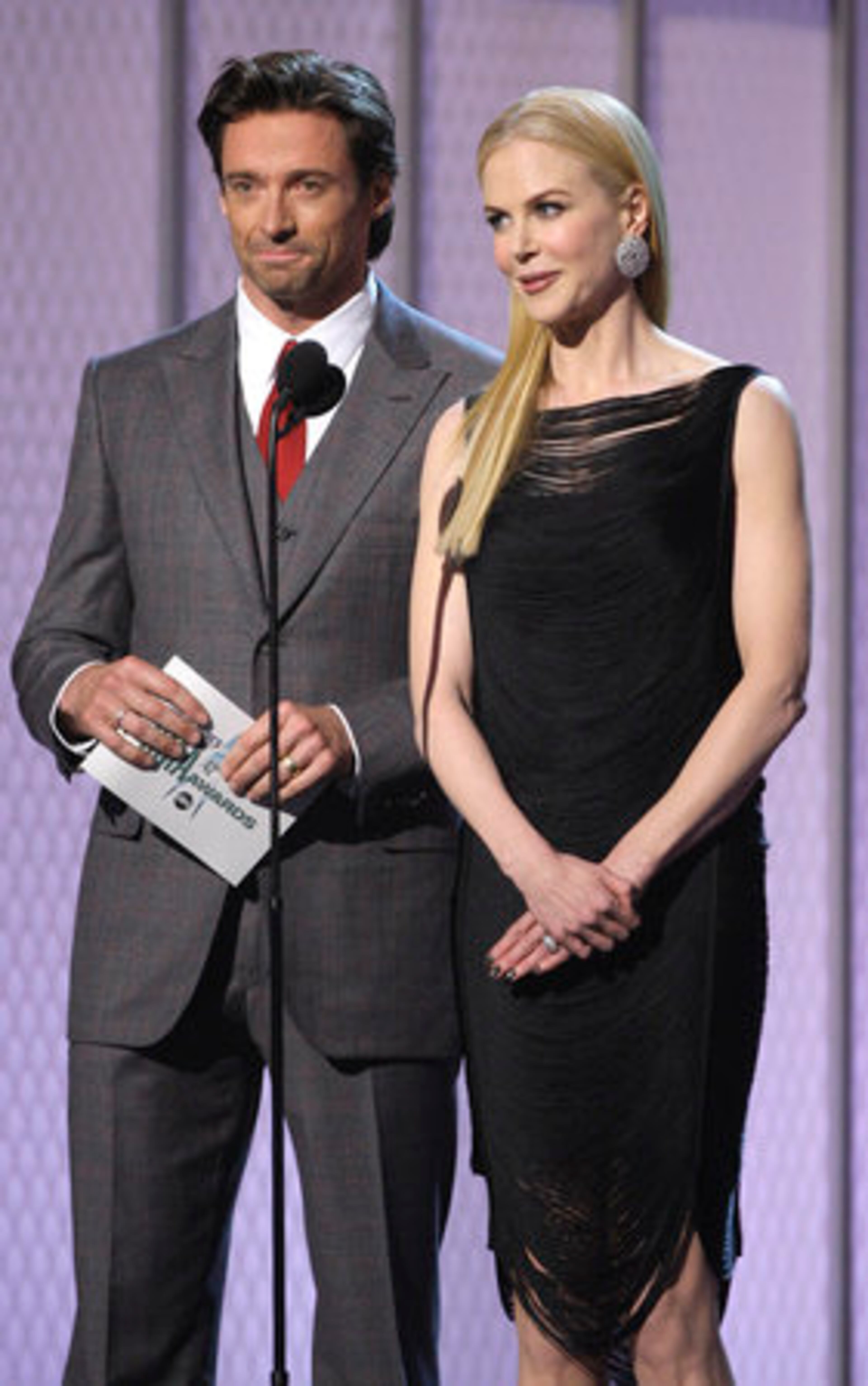 Nicole Kidman and Hugh Jackman, who are costarring in the upcoming movie, "Australia," present the night's first award.