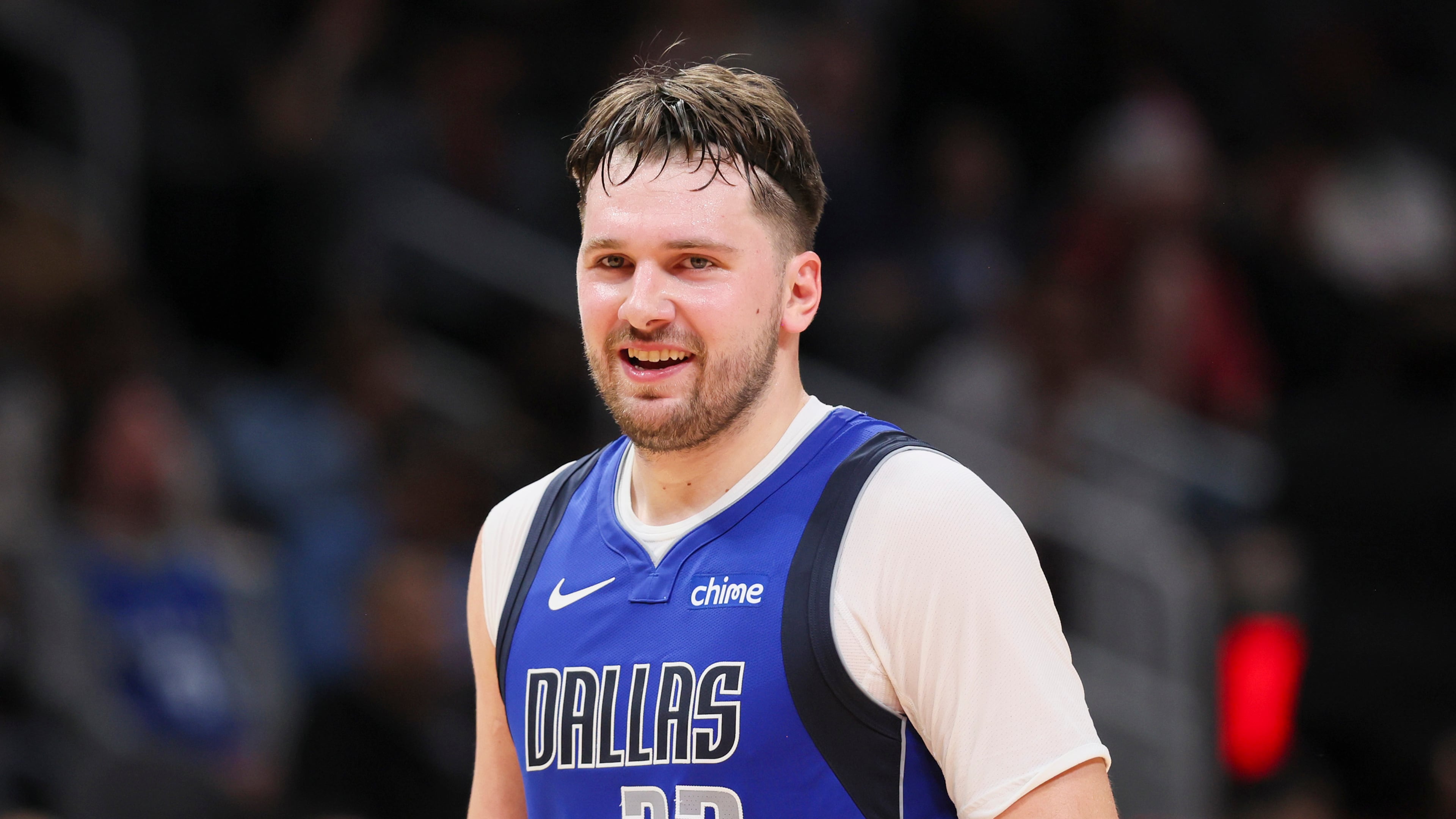 The Dallas Mavericks' Luka Doncic (77) reacts to a play during the first half against the Atlanta Hawks at State Farm Arena on Friday, Jan. 26, 2024, in Atlanta. The Mavericks won, 148-143, as Doncic scored a franchise-record 73 points. (Jason Getz/The Atlanta Journal-Constitution/TNS)