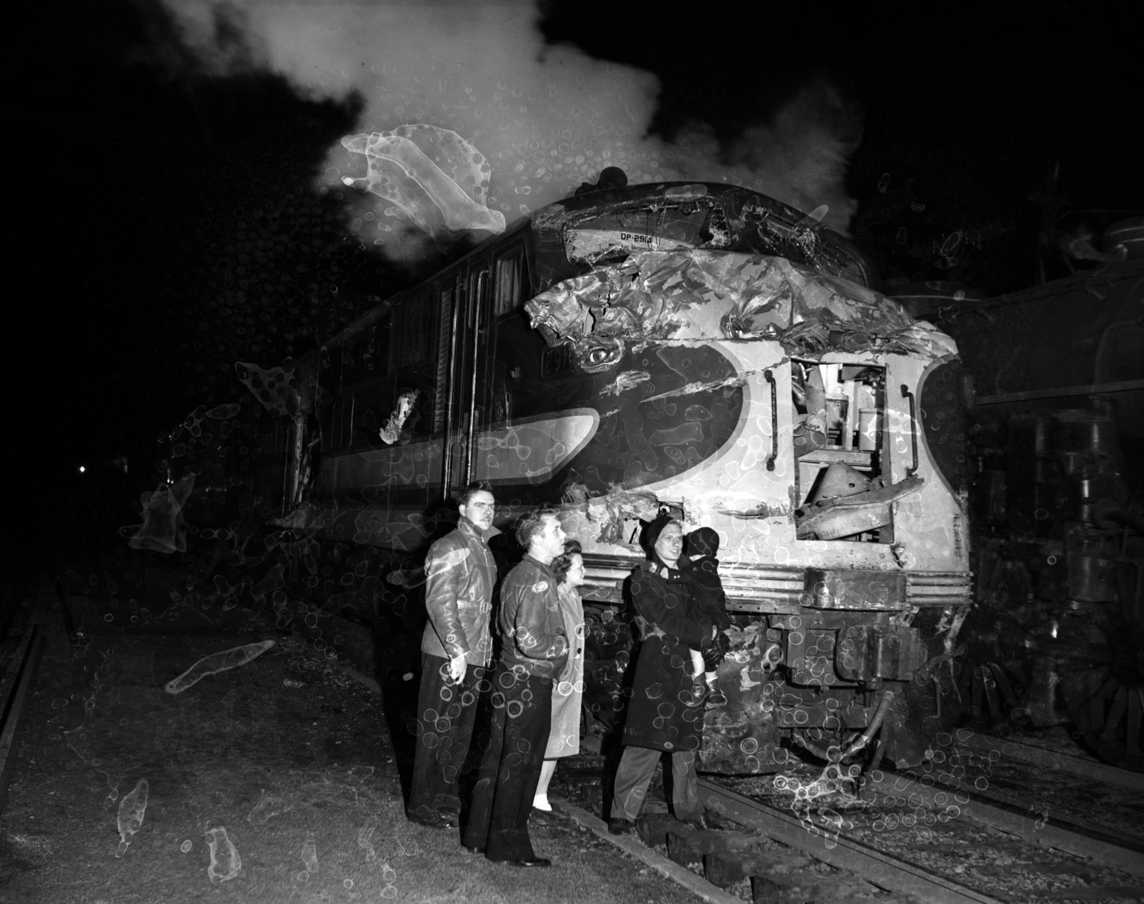 Locomotive after a collision, Chamblee, Georgia, 1948. Damaged negative. N02-043_01, Tracy O'Neal Photographic Collection, 1923-1975, Photographic Collection. Special Collections and Archives, Georgia State University Library.