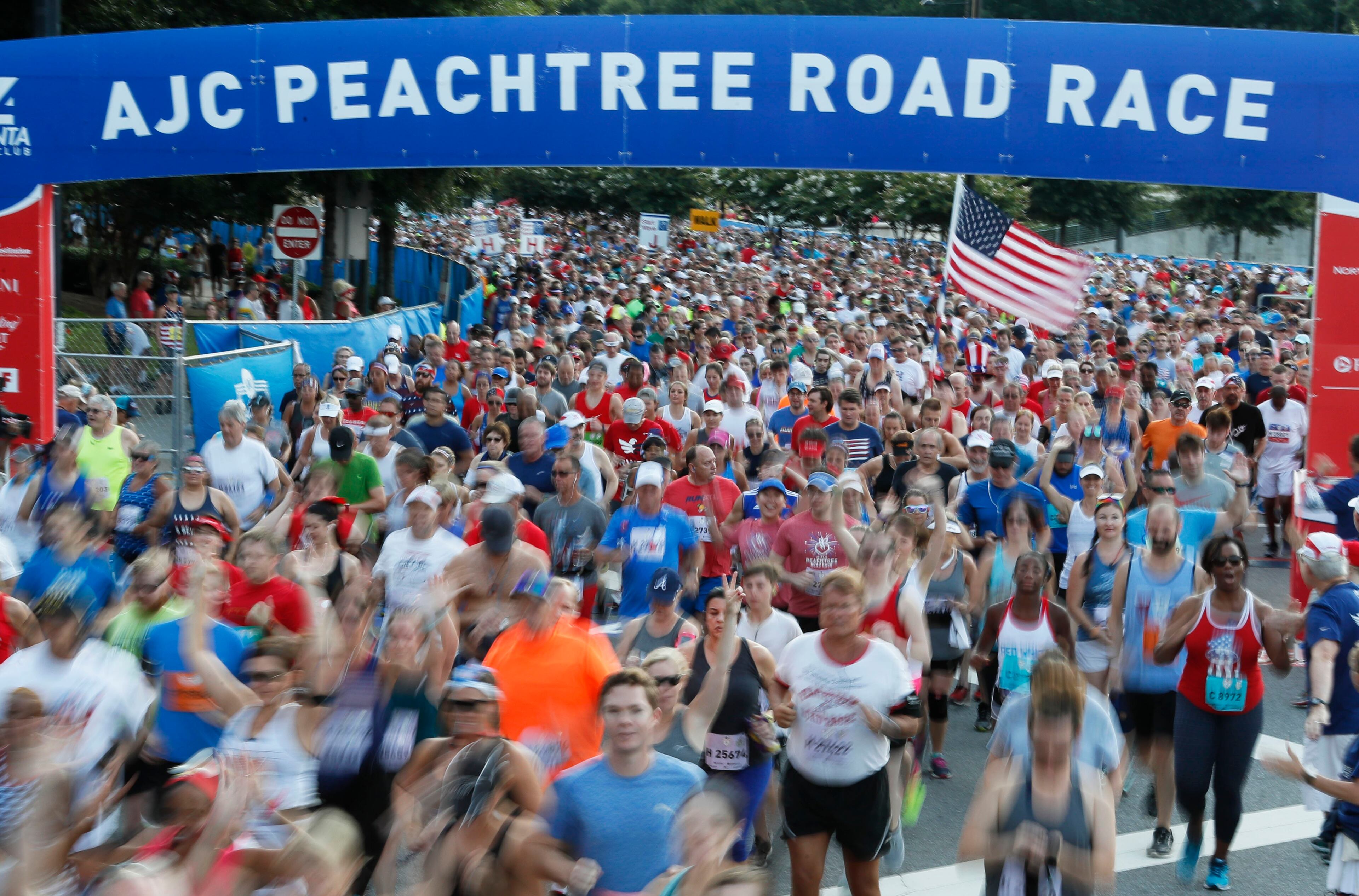 Non elite runners at the starting line. The 49th running of the AJC Peachtree Road Race in Atlanta took off on Peachtree Street near Lenox Mall. Organized by the Atlanta Track Club, the event was expected to draw 60,000 runners and walkers. BOB ANDRES /BANDRES@AJC.COM
