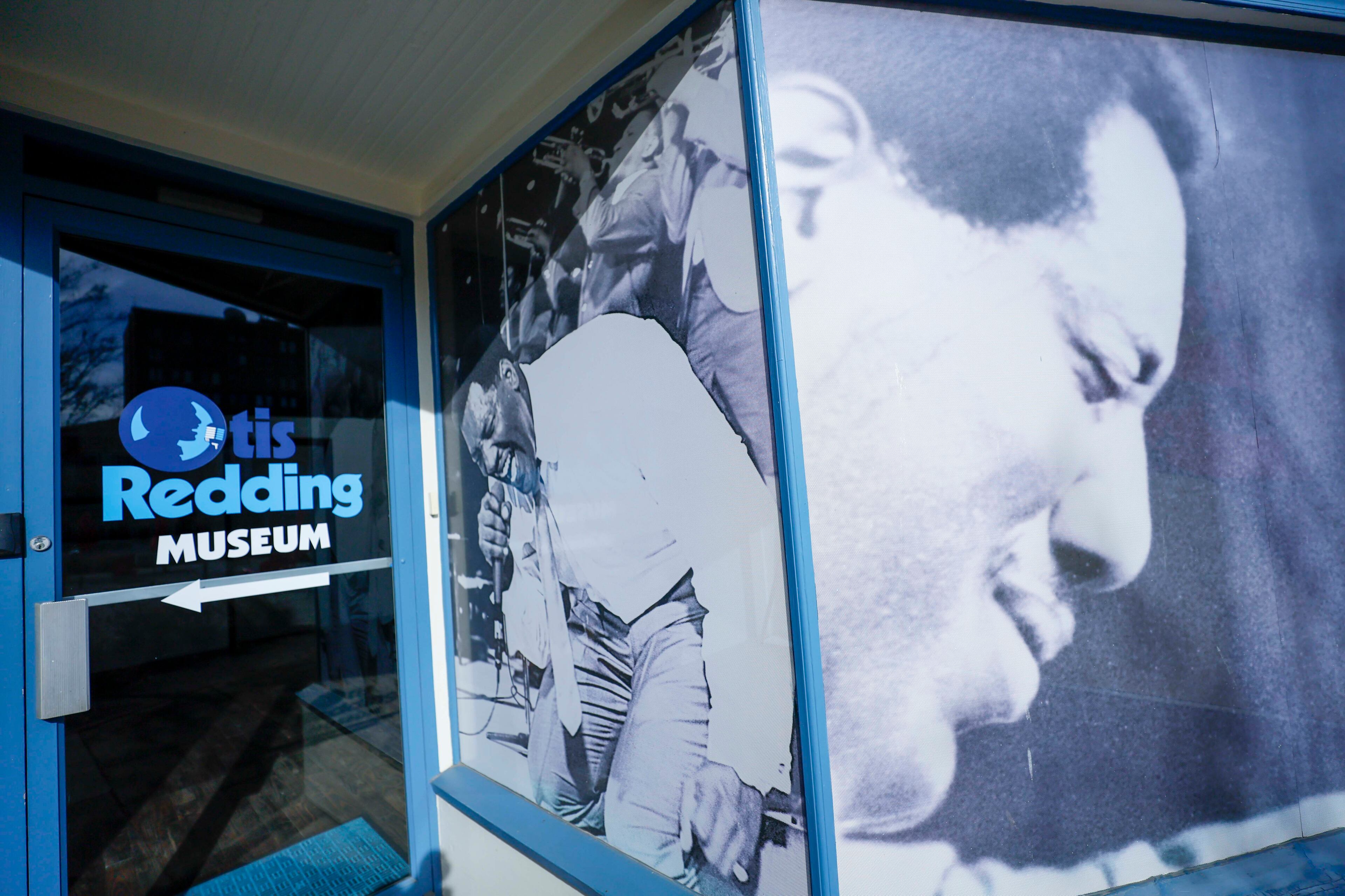 Images of the legendary soul singer are displayed at the entrance of the Otis Redding museum in downtown Macon. (Miguel Martinez/ AJC)
