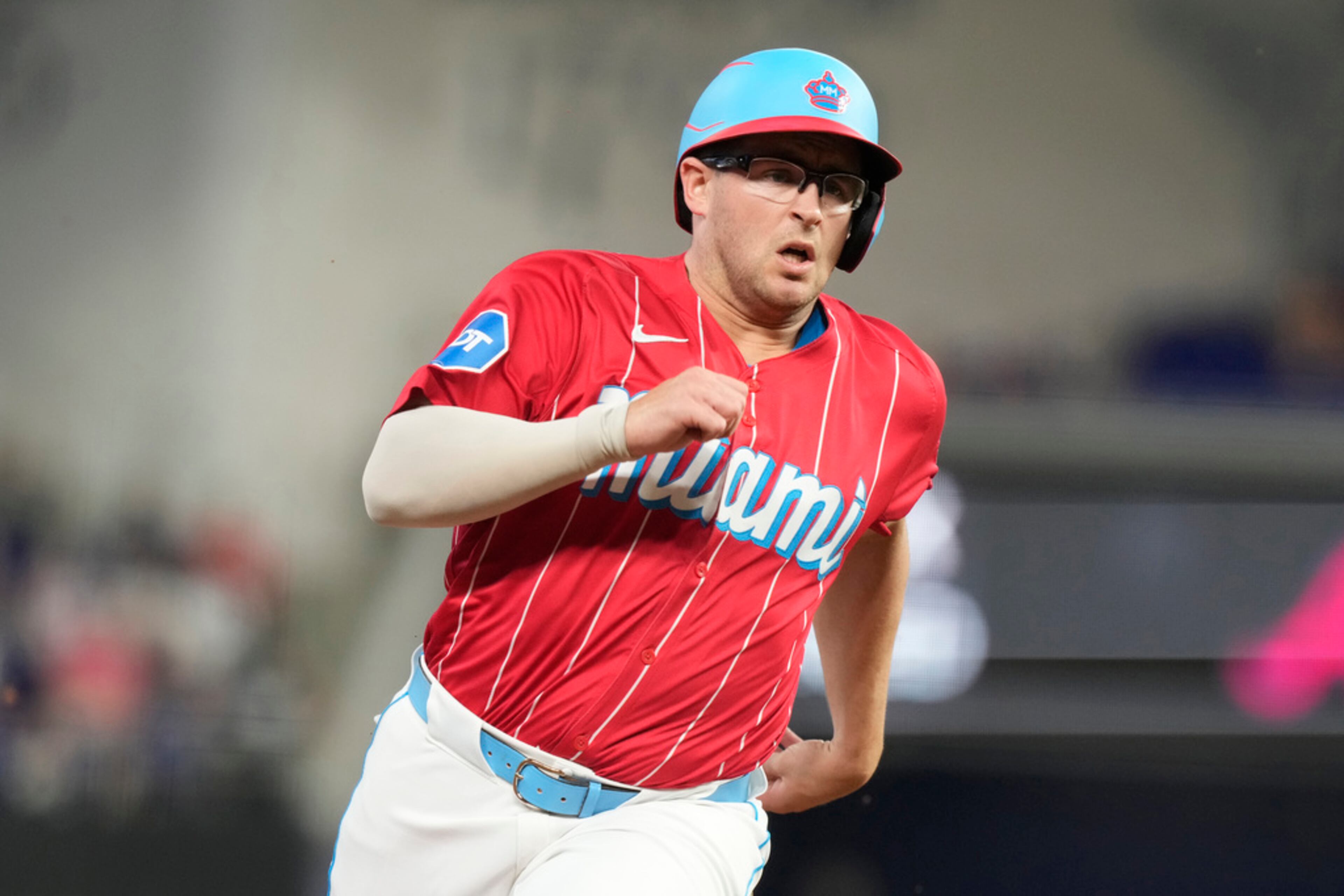 Miami Marlins' Jonah Bride runs to score on a triple by Derek Hill during the first inning of a baseball game against the Atlanta Braves, Saturday, Sept. 21, 2024, in Miami. (AP Photo/Marta Lavandier)