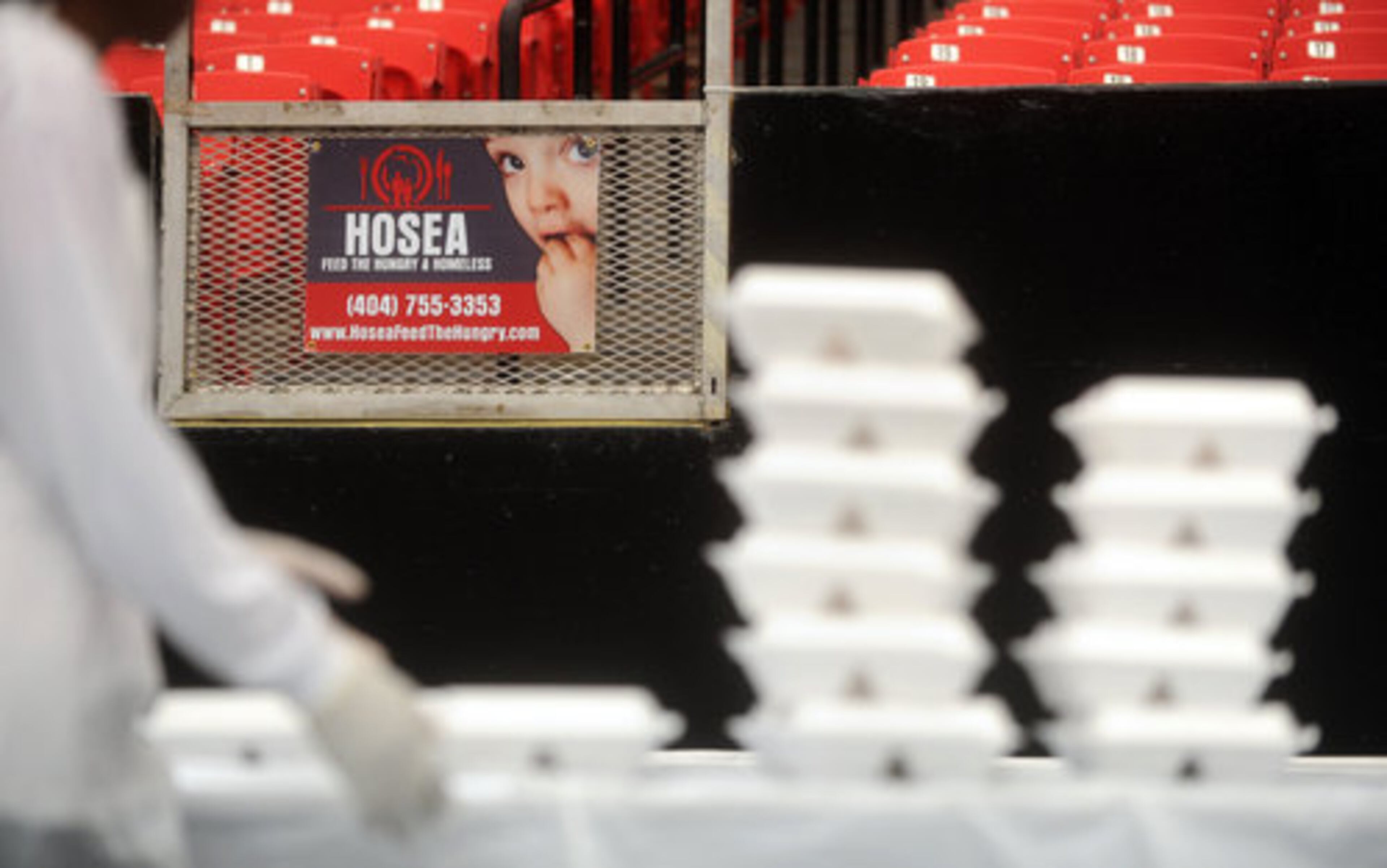 Boxes of food are stacked as volunteers await the arrival of those looking for an Easter meal.