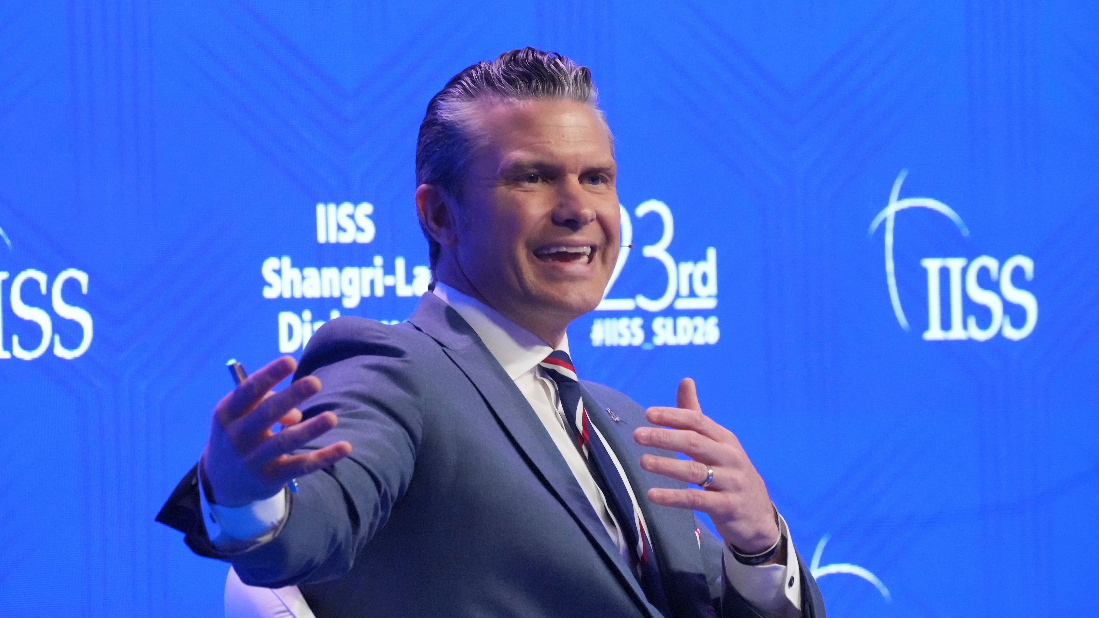 U.S. Defense Secretary Pete Hegseth gestures as he speaks during the Shangri-La Dialogue, Asia's annual defense and security forum, in Singapore, Saturday, May 30, 2026. (AP Photo/Achmad Ibrahim)